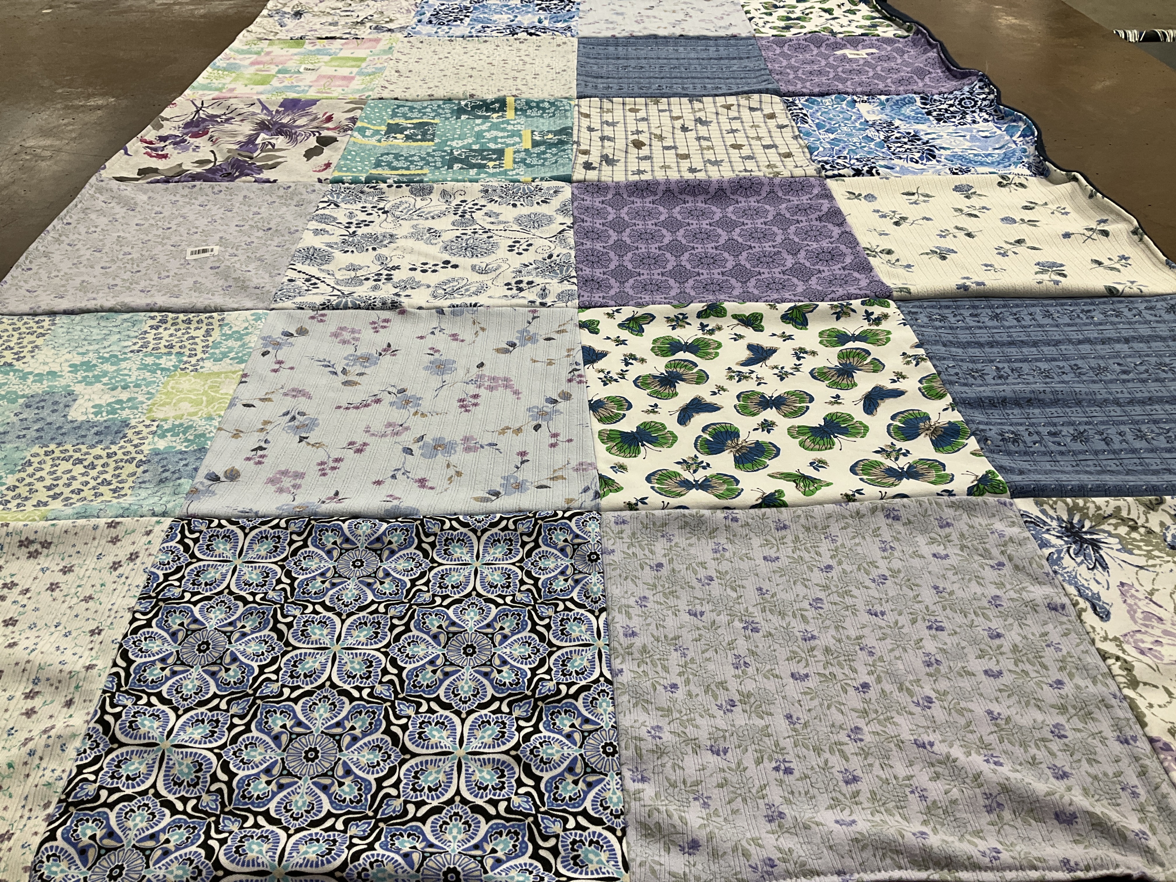 T-shirt quilt with quilting, fabric design themes by Katherine  from VA