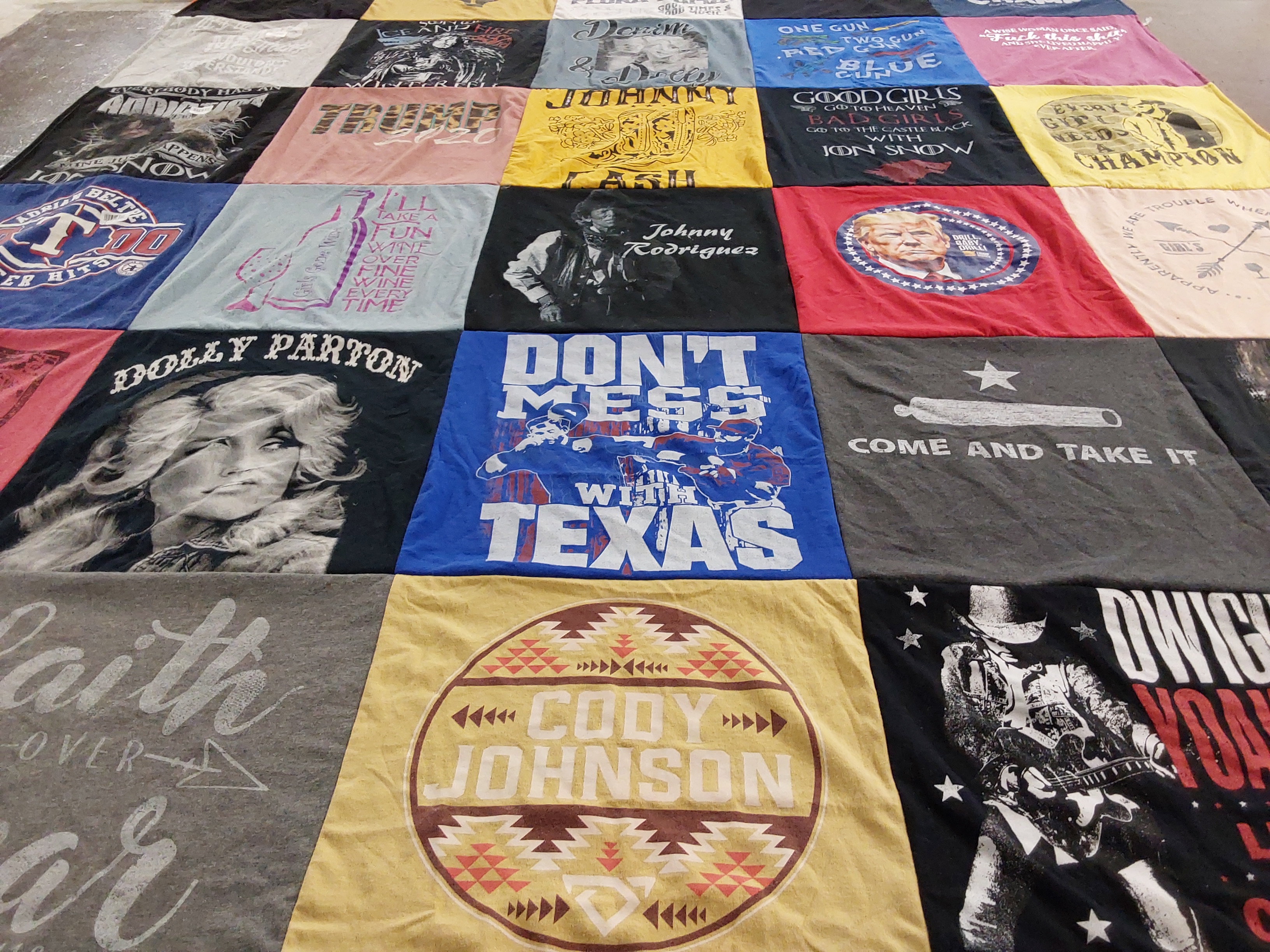 T-shirt quilt with country music, texas culture themes by Denise from TX