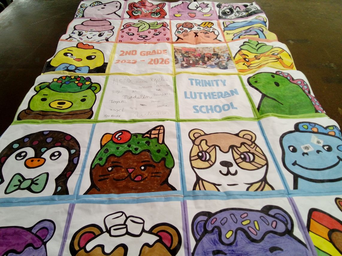 T-shirt quilt from trinity lutheran school by Holly from MO