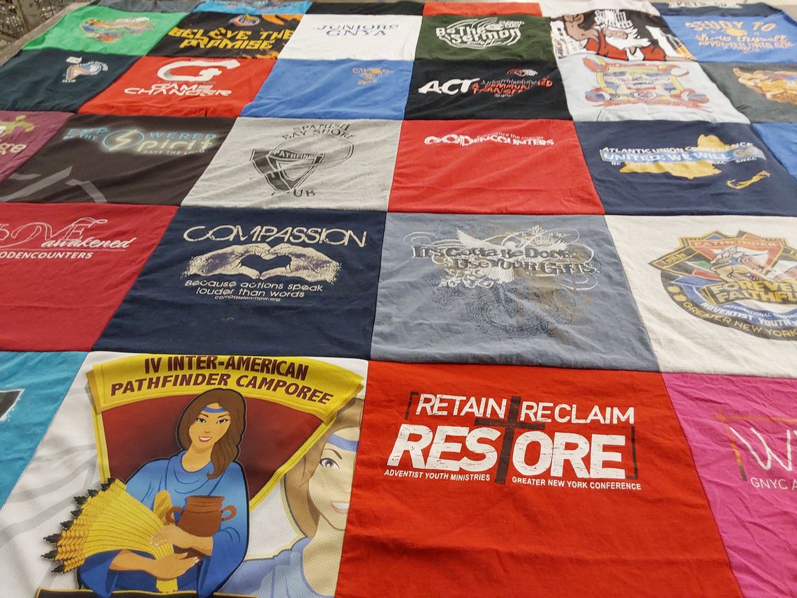 T-shirt quilt with youth ministry, community service themes by Ginel from NY