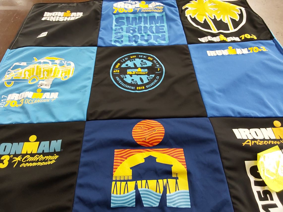 T-shirt quilt with triathlon, endurance sports themes by Scott from CA