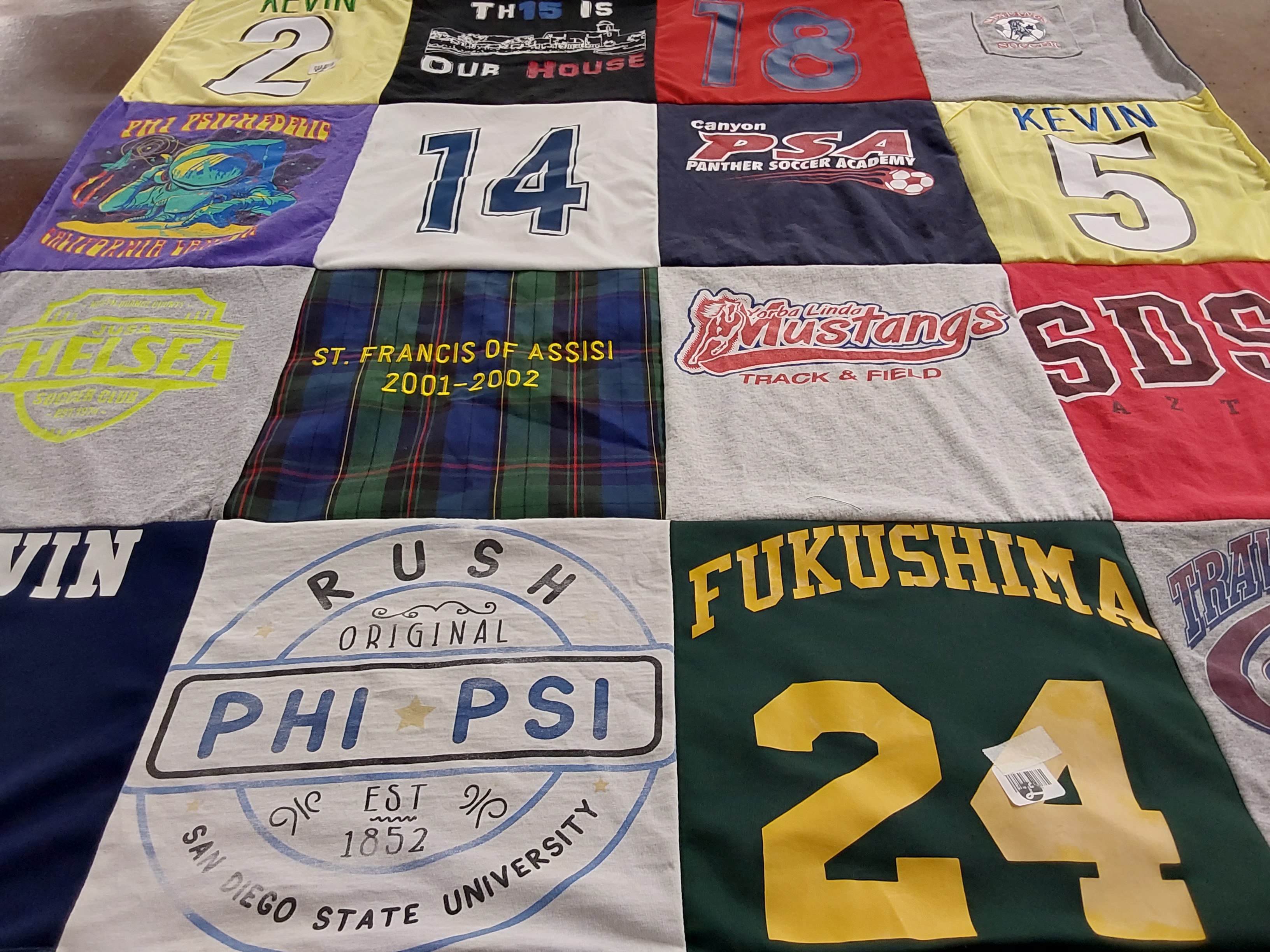 T-shirt quilt featuring yorba linda mustangs track and field, canyon panther soccer academy by Judith from CA