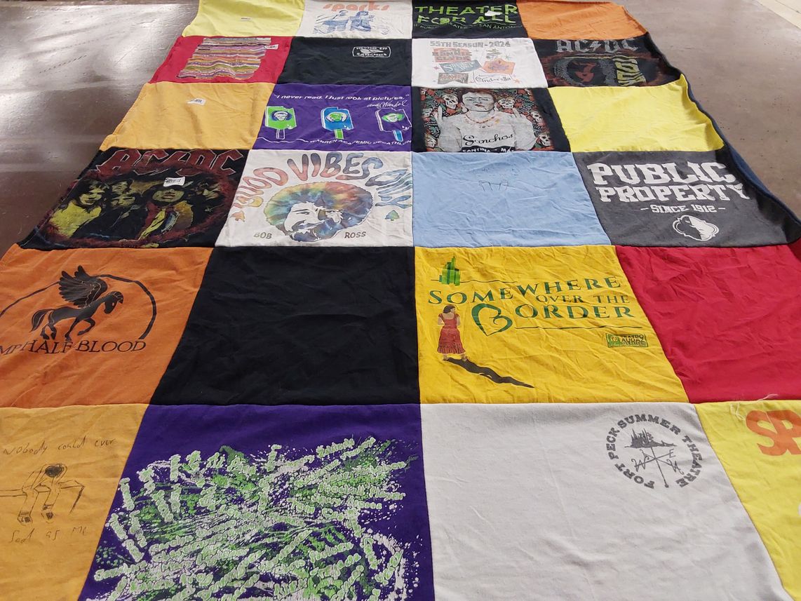 T-shirt quilt with theater, art themes by Carolyn from TX