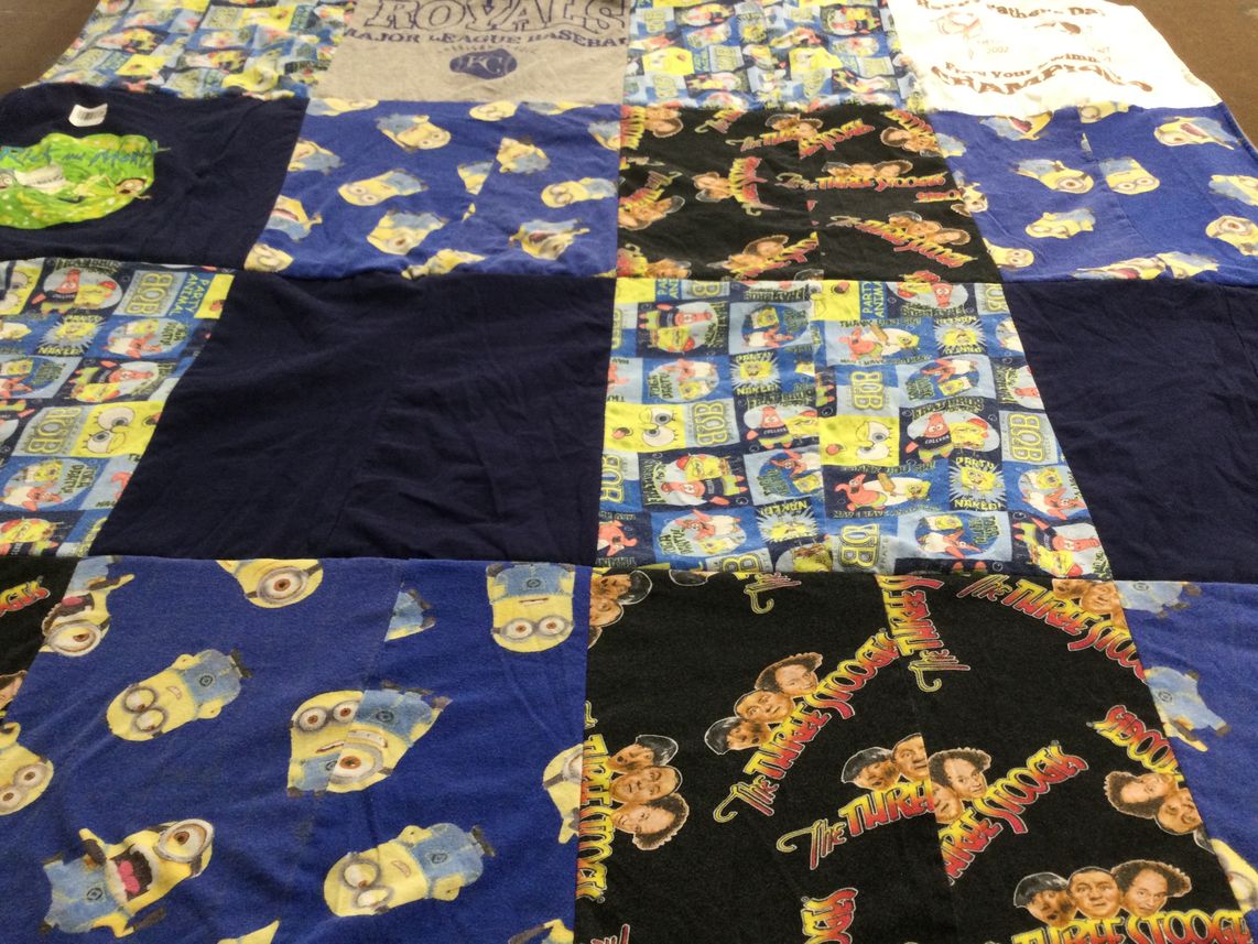 T-shirt quilt with animated films, cartoons themes by Mindy from KS