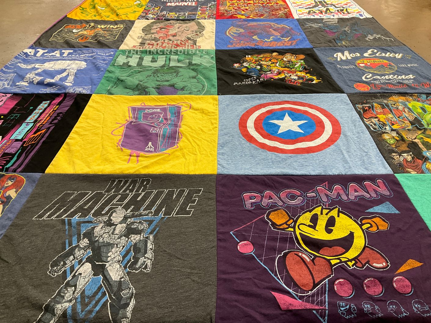 T-shirt quilt with comics, video games themes by Jeremiah from TX