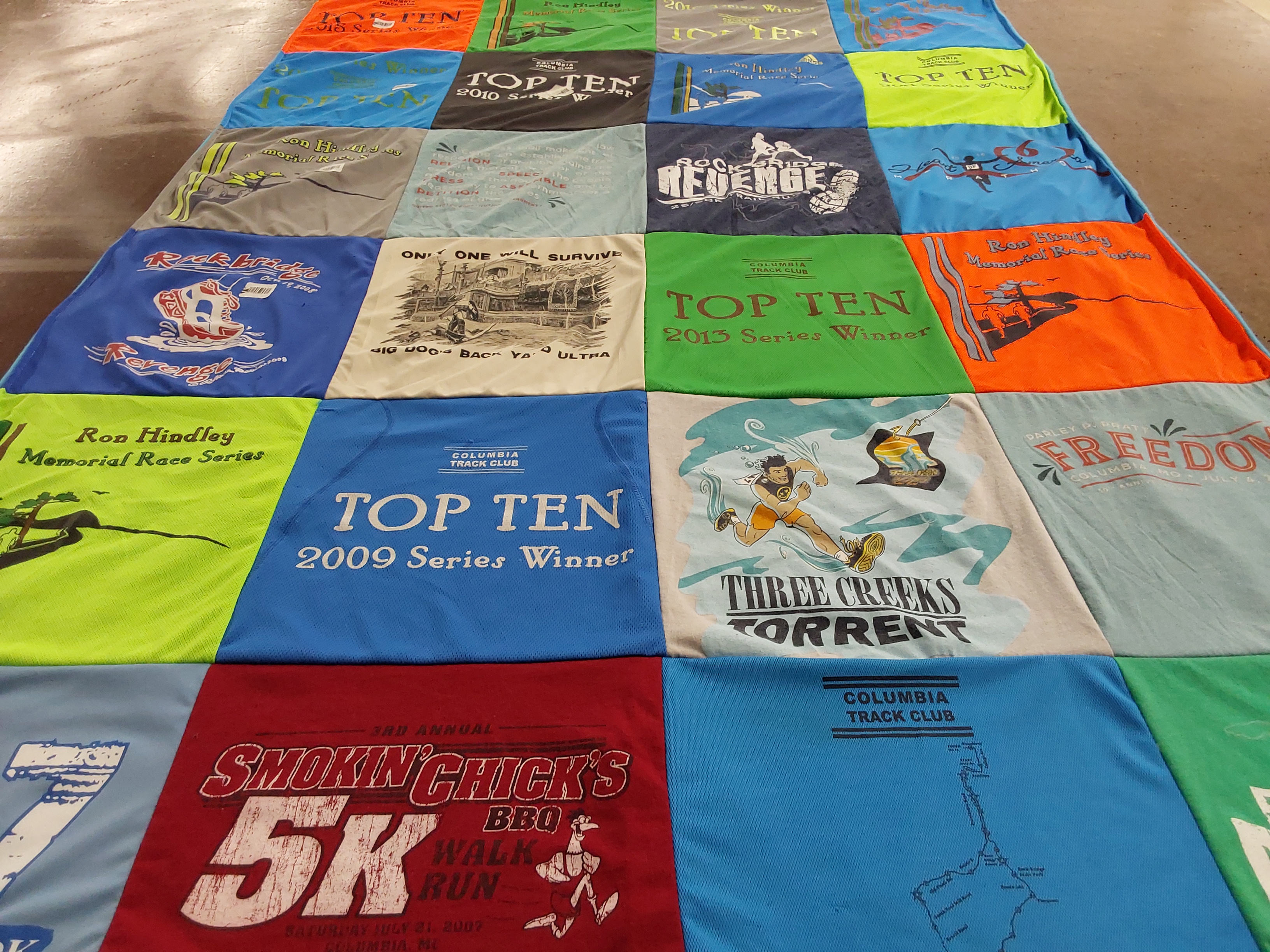 T-shirt quilt with running, races themes by Hugh from MO