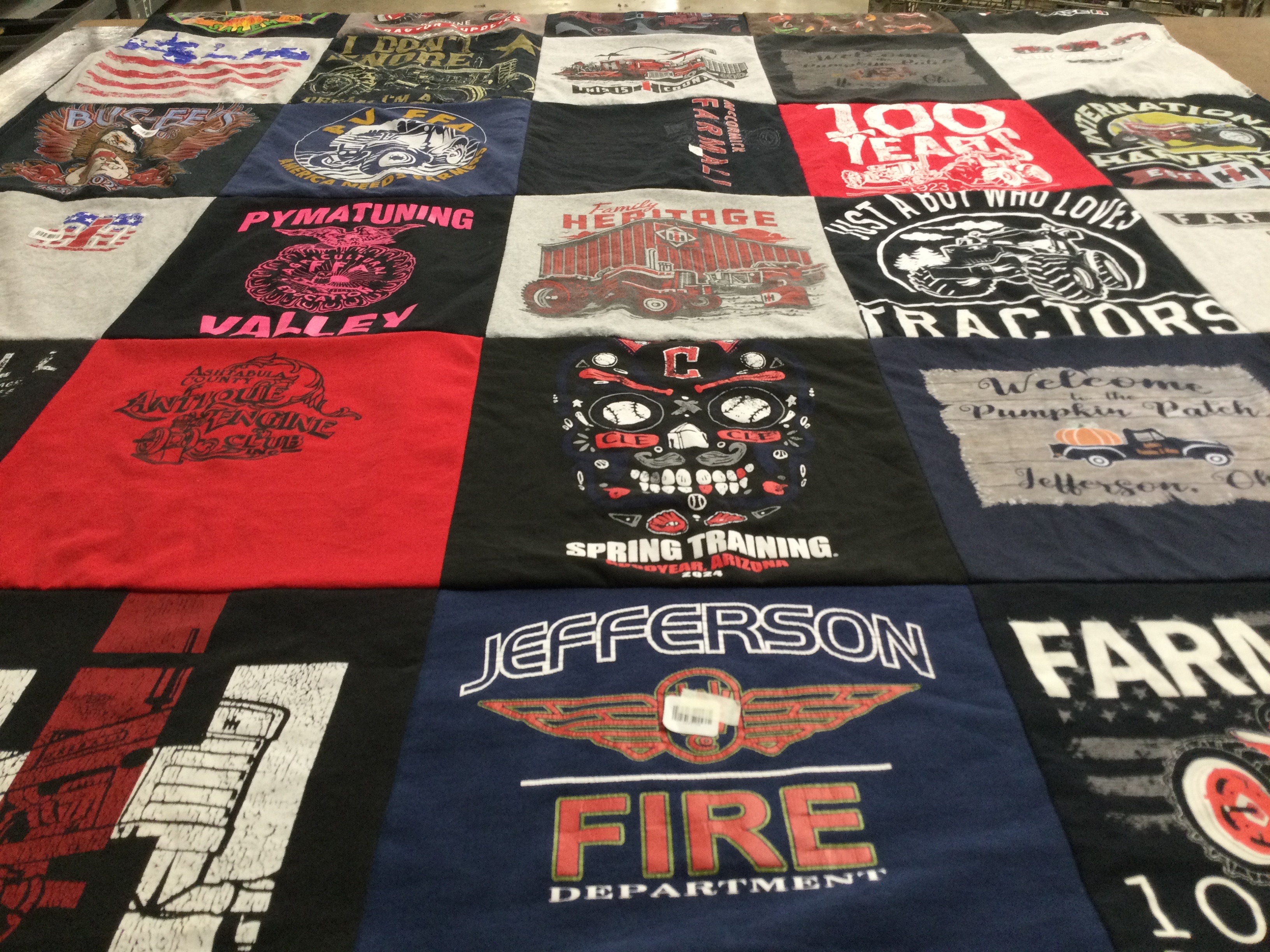 T-shirt quilt with tractors, firefighting themes by Christina from OH