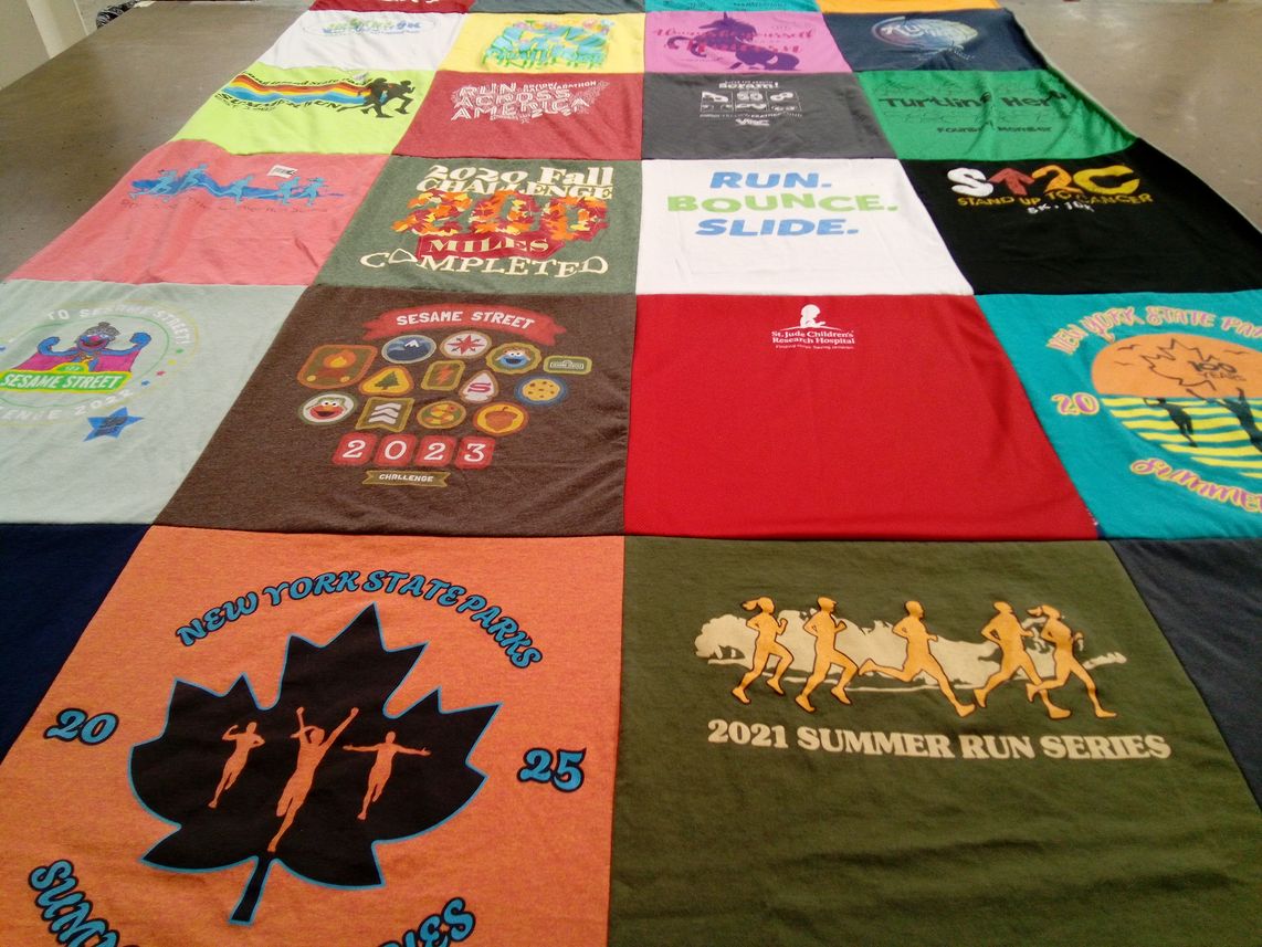 T-shirt quilt with running, childhood education themes by Andra from NY