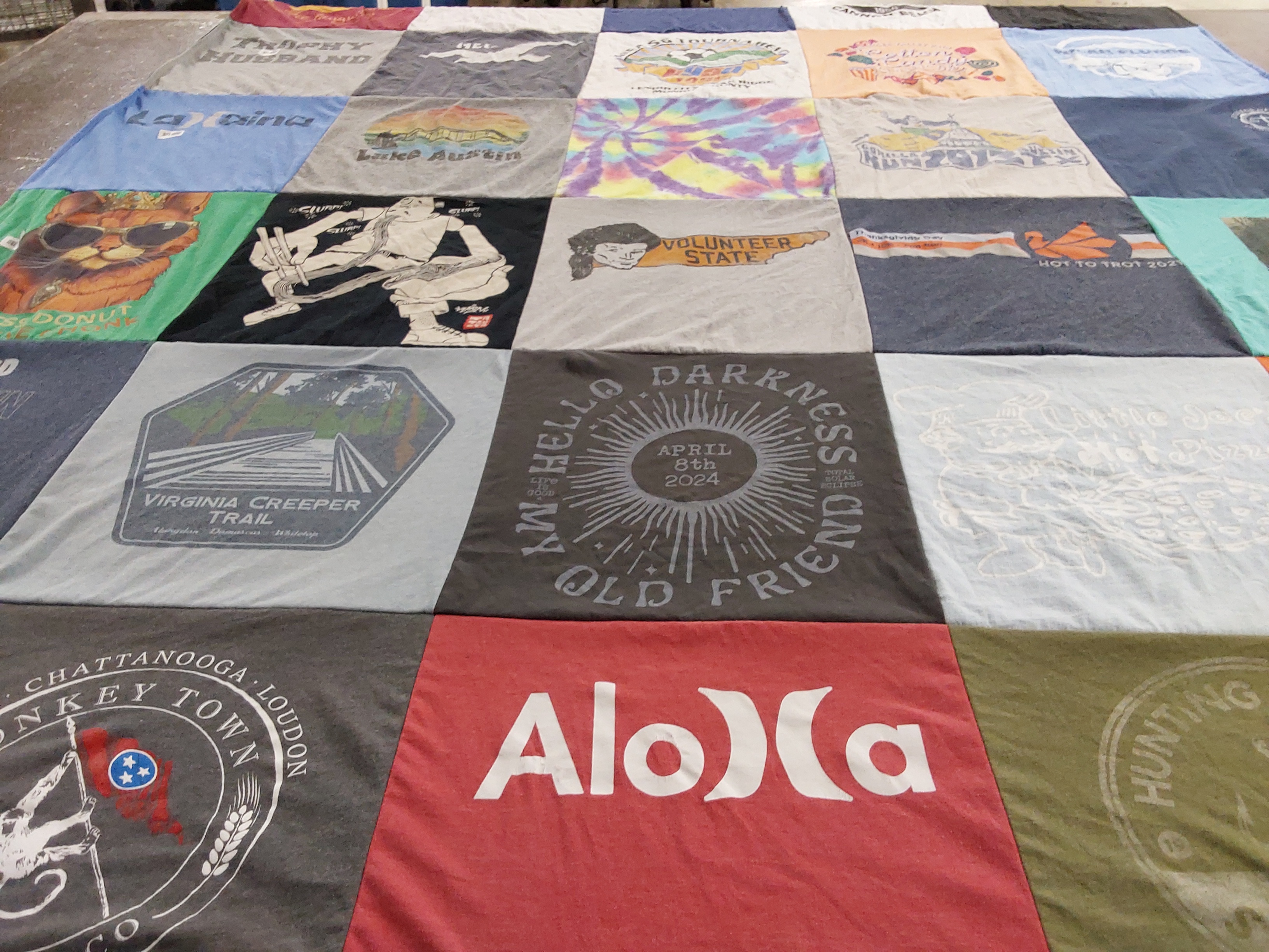 T-shirt quilt with hiking, travel themes by Alexandra from TN