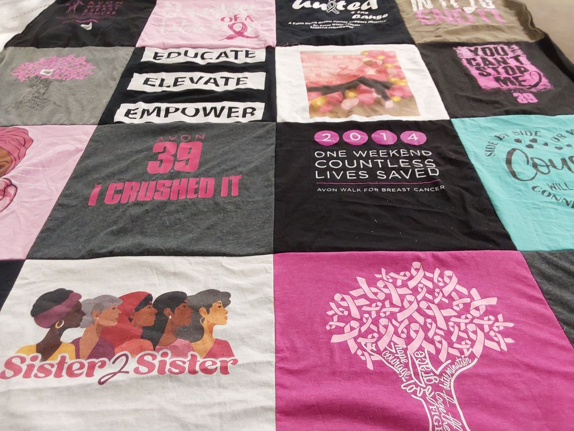 T-shirt quilt with breast cancer awareness, community support themes by Venus from CA