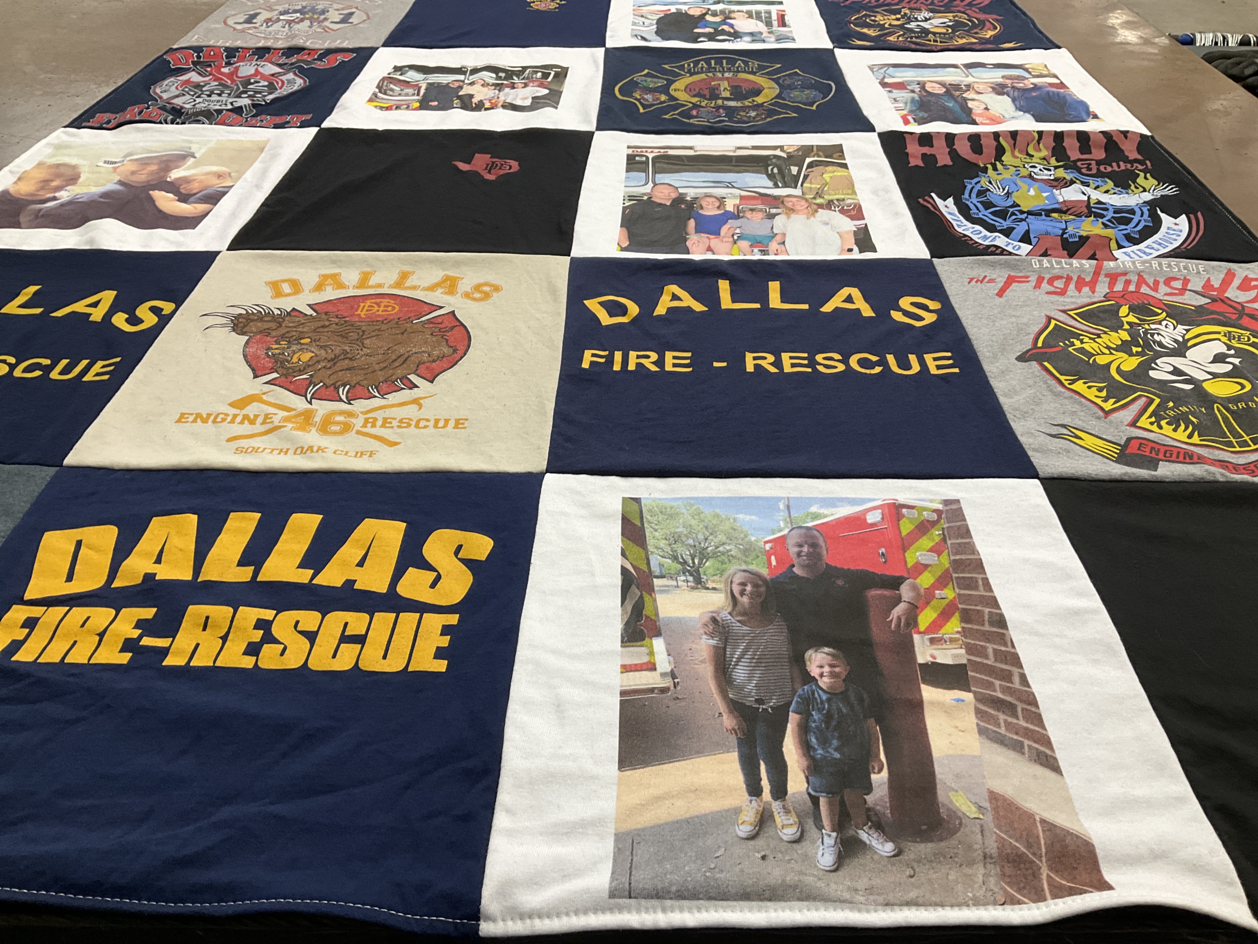 T-shirt quilt with firefighting, community service themes by Erin from TX
