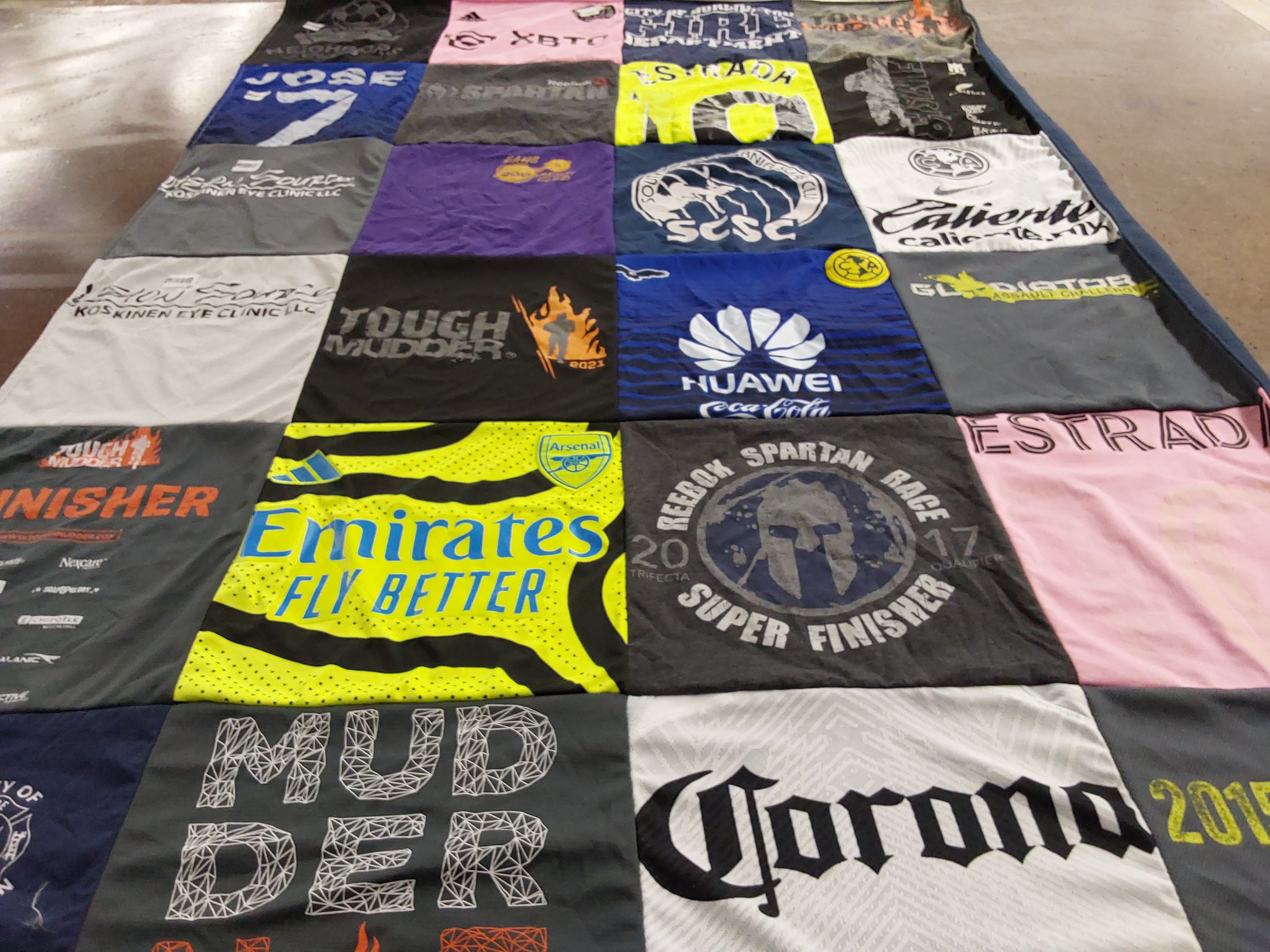 T-shirt quilt featuring arsenal football club by Megan from WI