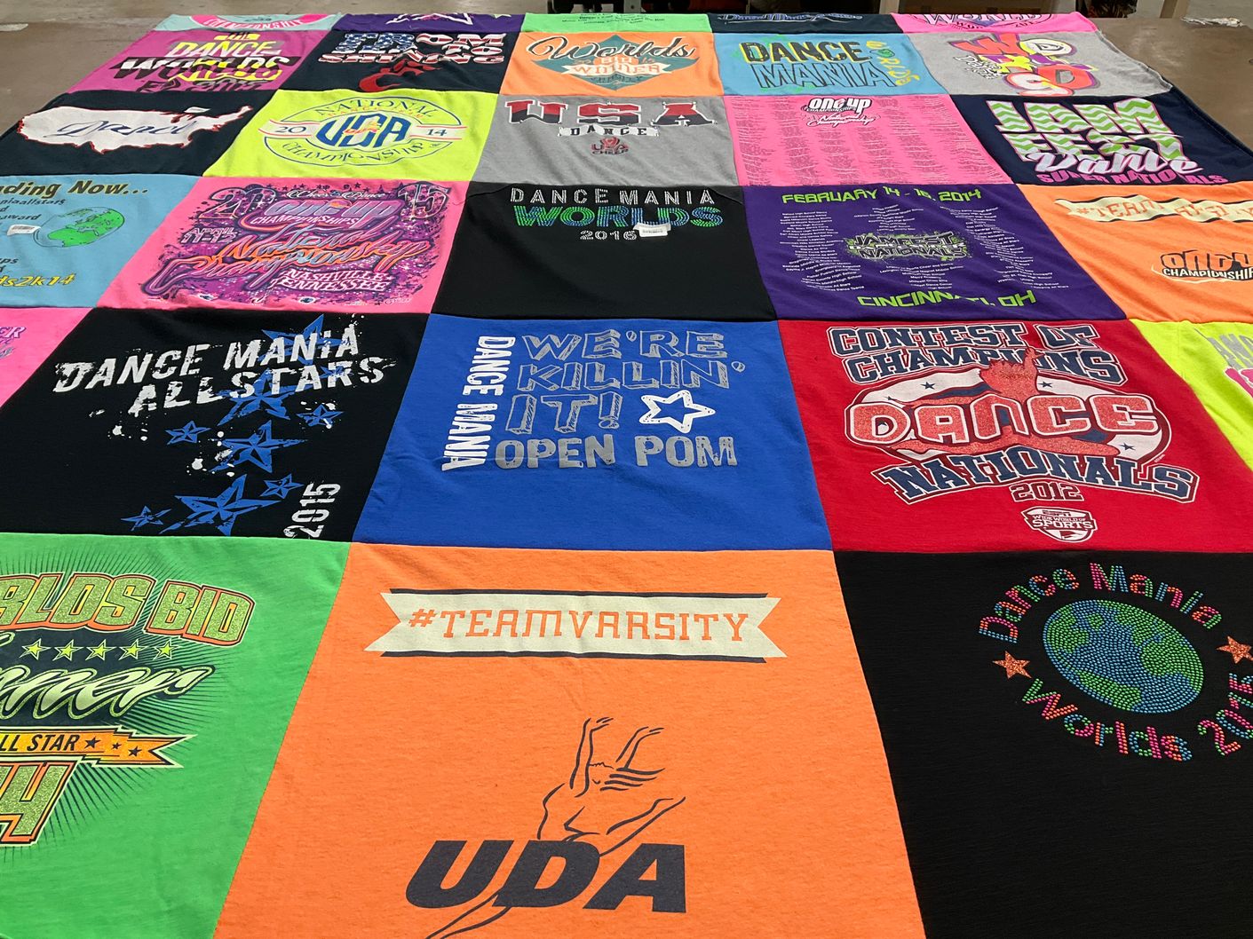 T-shirt quilt with dance, cheerleading themes by Michelle from FL