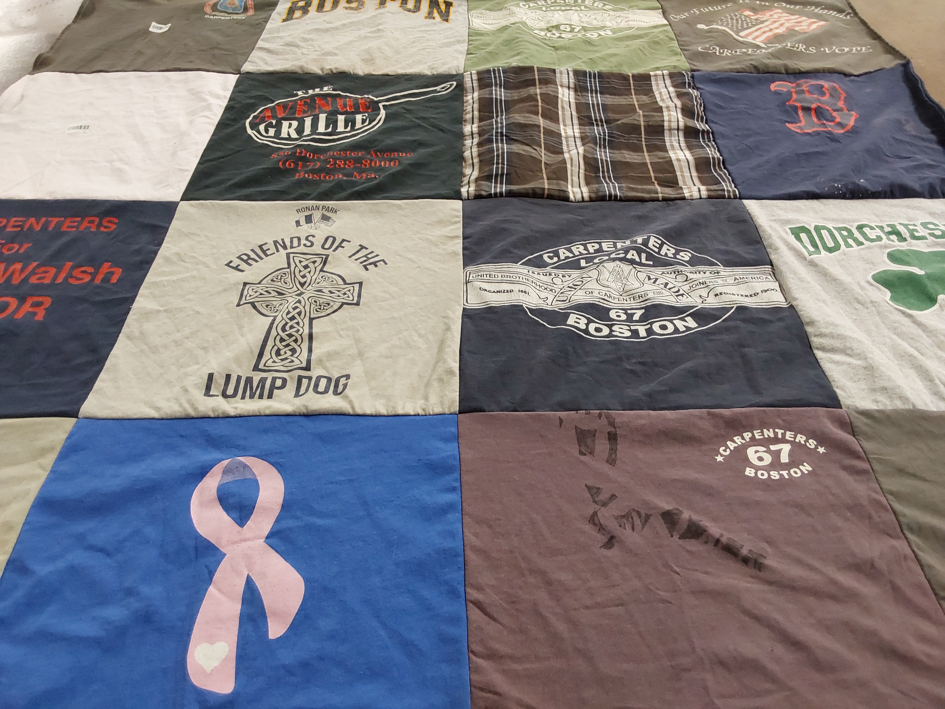 T-shirt quilt with local politics, community themes by Julie from MA