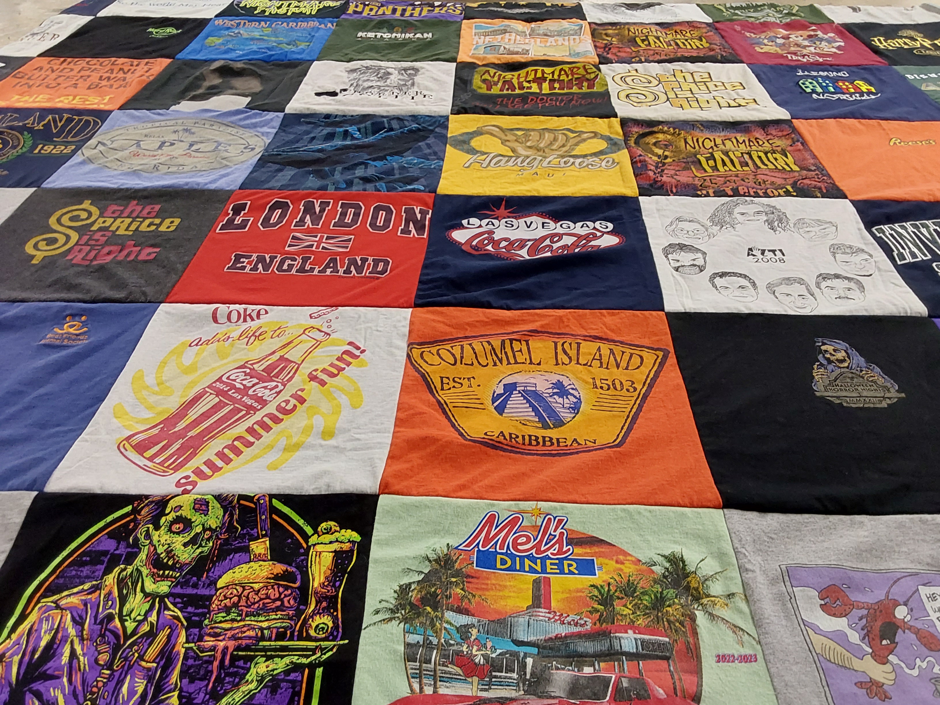 T-shirt quilt with travel, food themes by Steven from CT