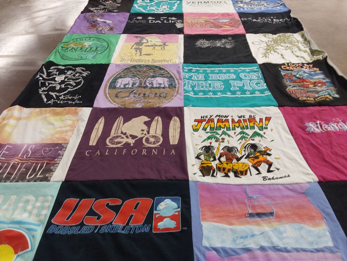 T-shirt quilt with travel, surfing themes by karen from NJ