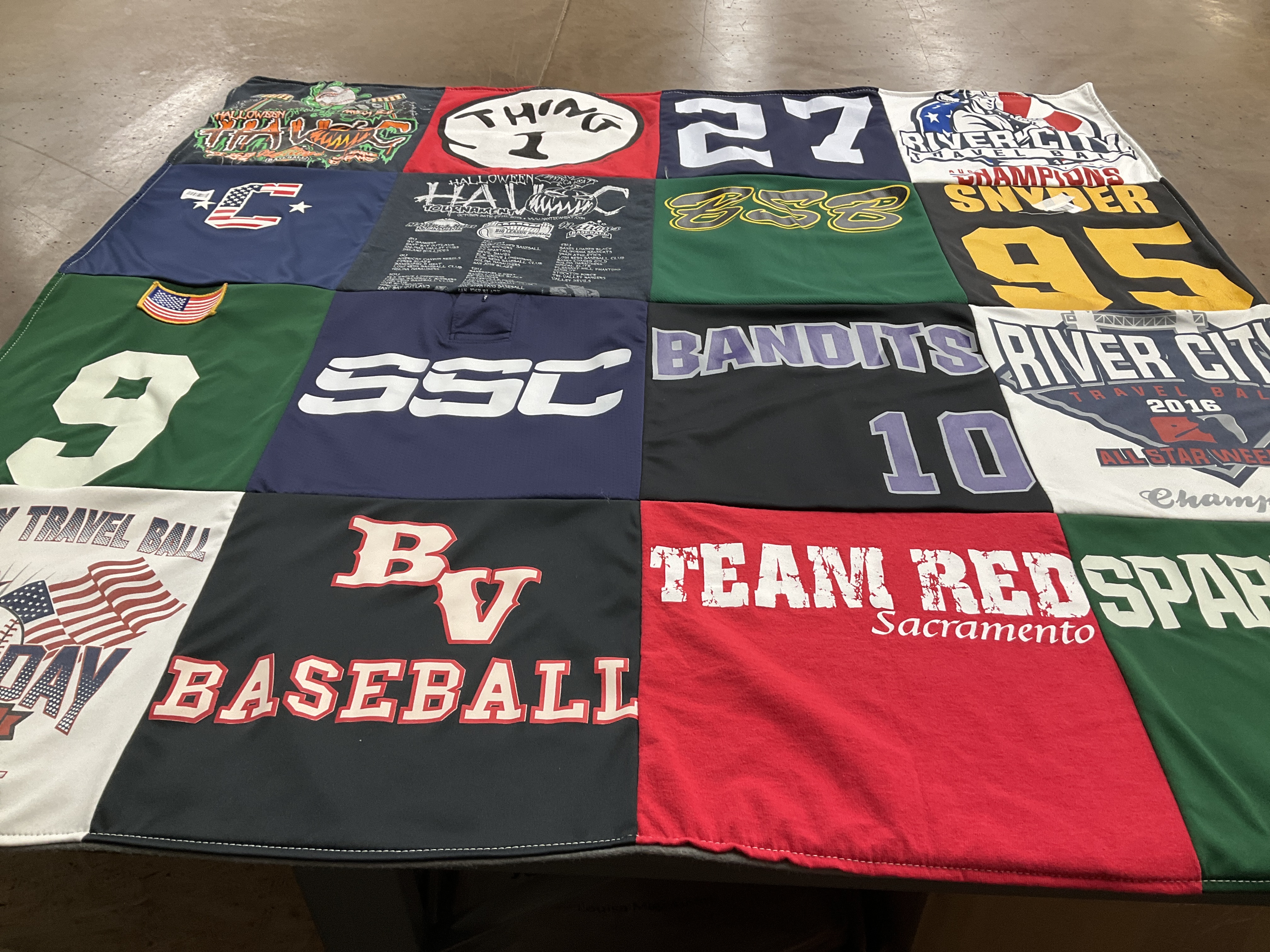 T-shirt quilt featuring river city travel baseball, team red by Montey from CA
