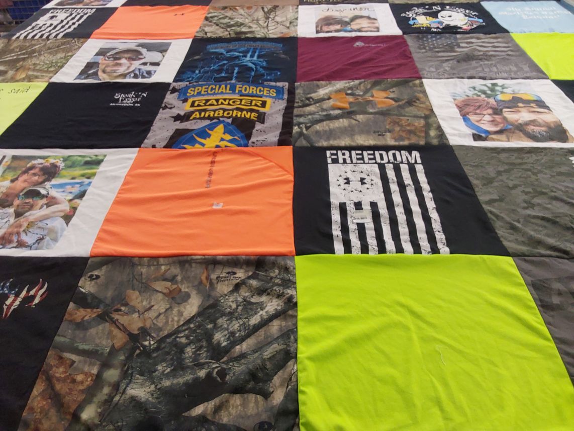 T-shirt quilt with military, outdoors themes by Nancy from MI