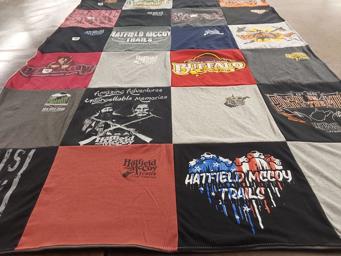 T-shirt quilt with outdoor, adventure themes by Corinne from OH