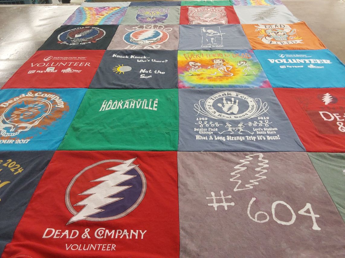 T-shirt quilt with music, volunteering themes by Carla from AR