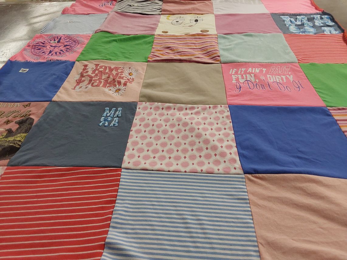 T-shirt quilt with travel, outdoors themes by Jessica from VA