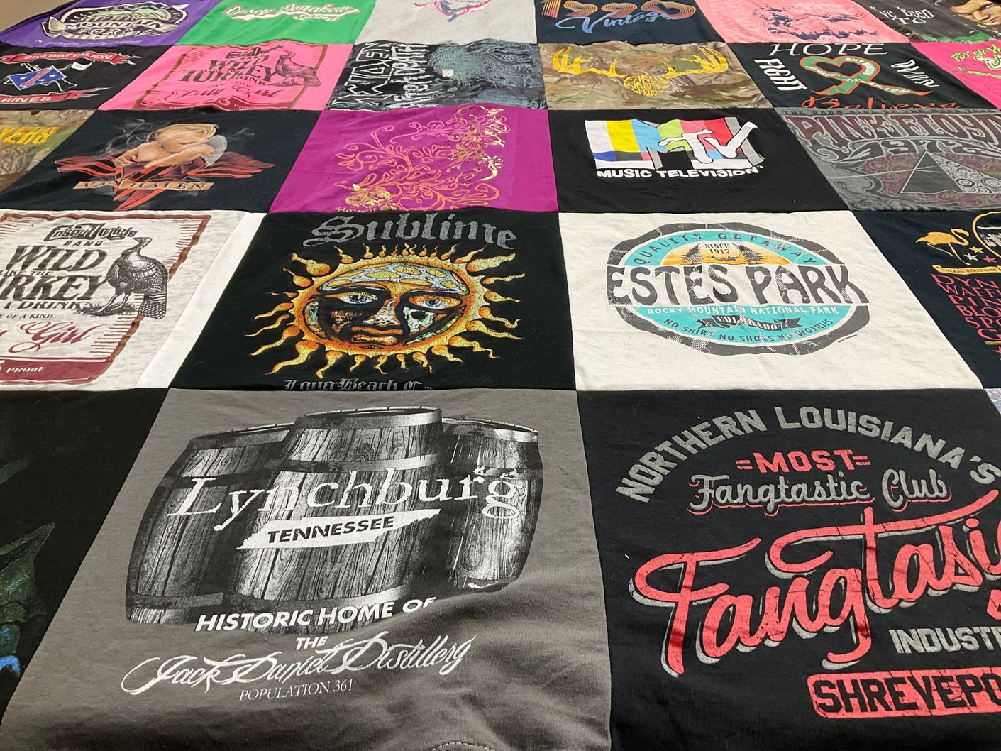 T-shirt quilt with travel, music themes by Keri from TX