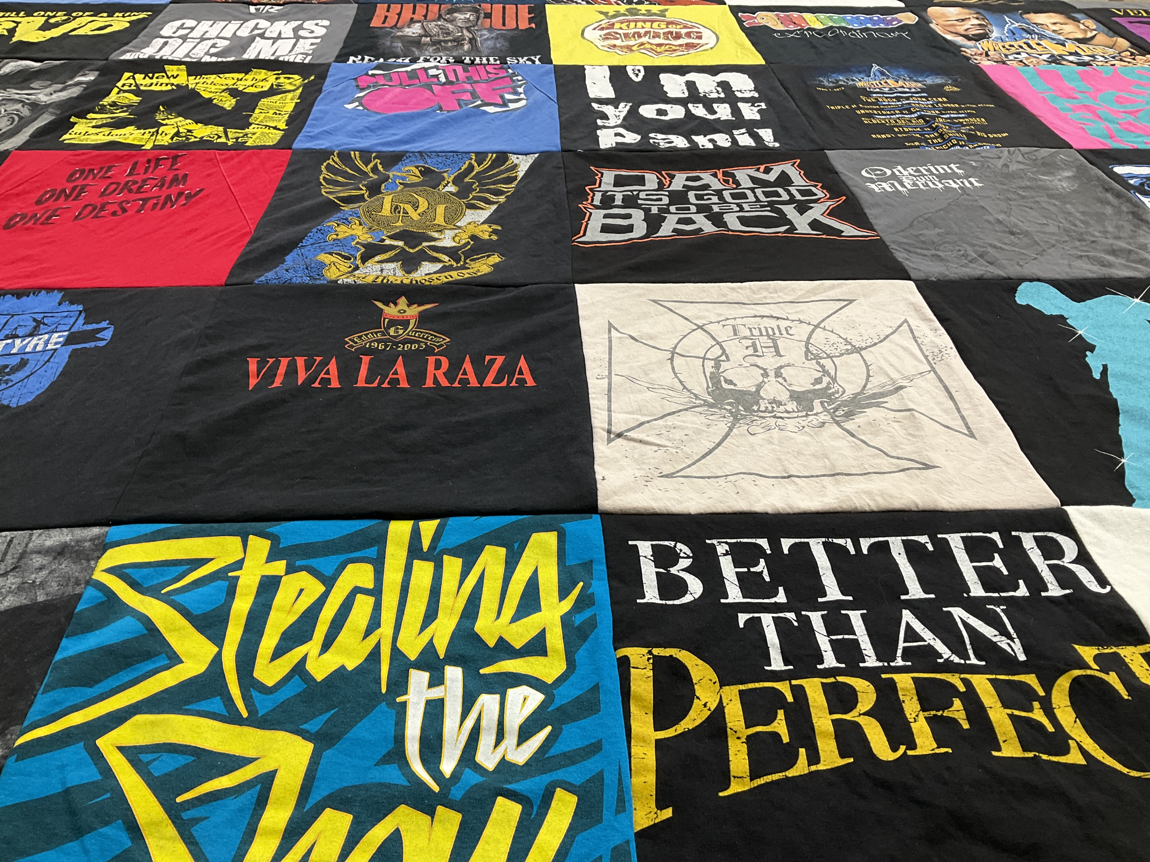 T-shirt quilt with wrestling themes by Jennifer from CT