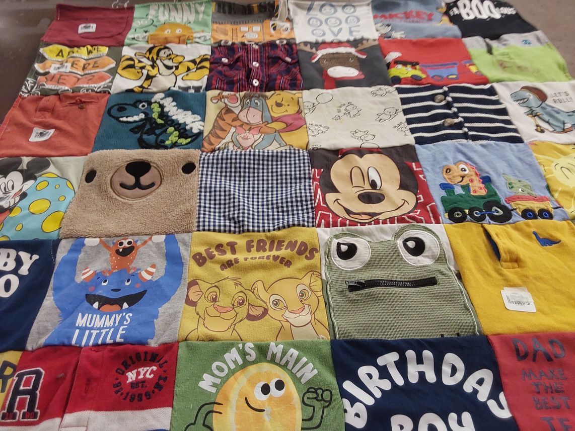 T-shirt quilt with cartoons, animals themes by Gayathri from WA