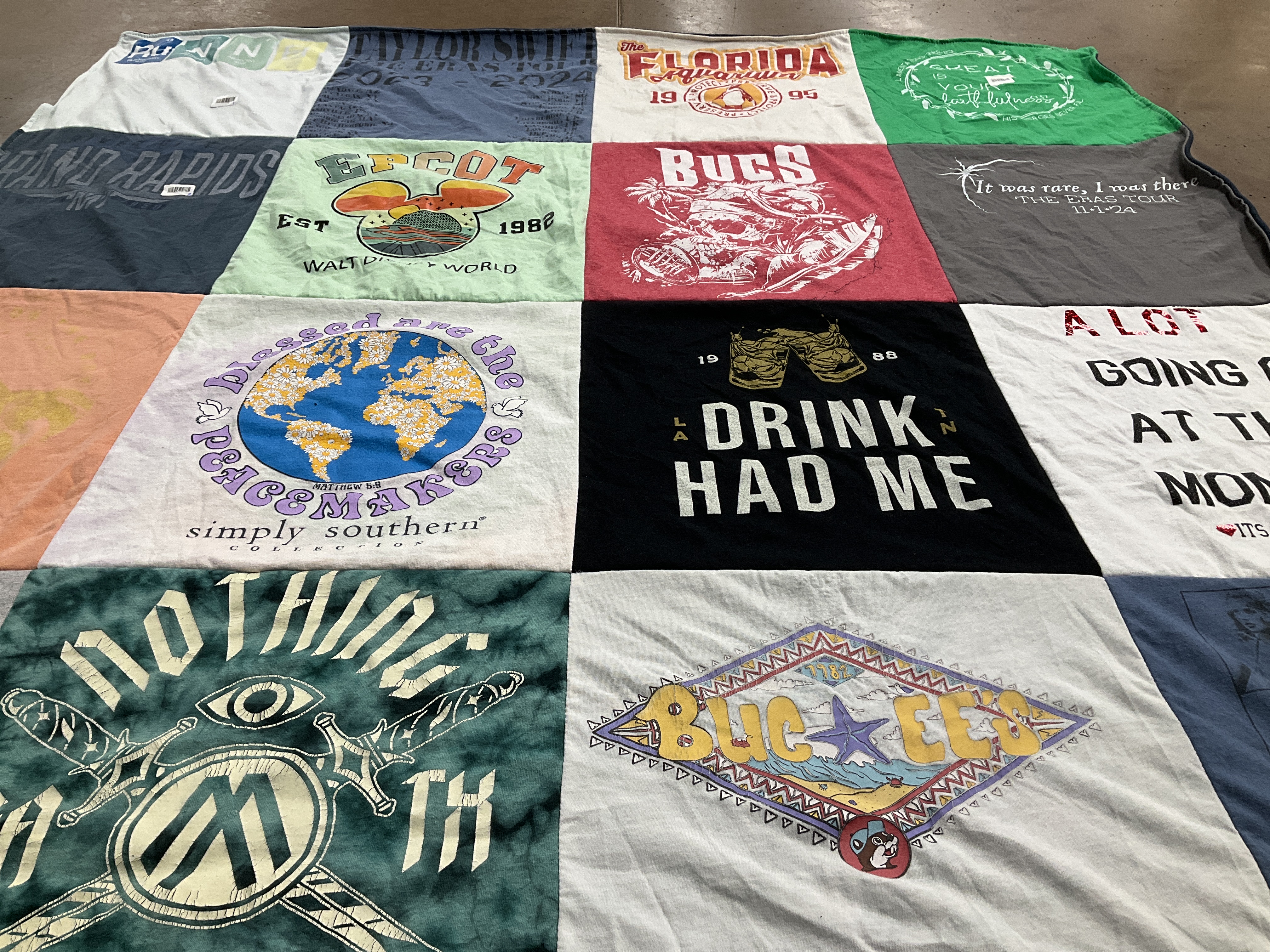T-shirt quilt with travel, sports themes by Jessica from FL