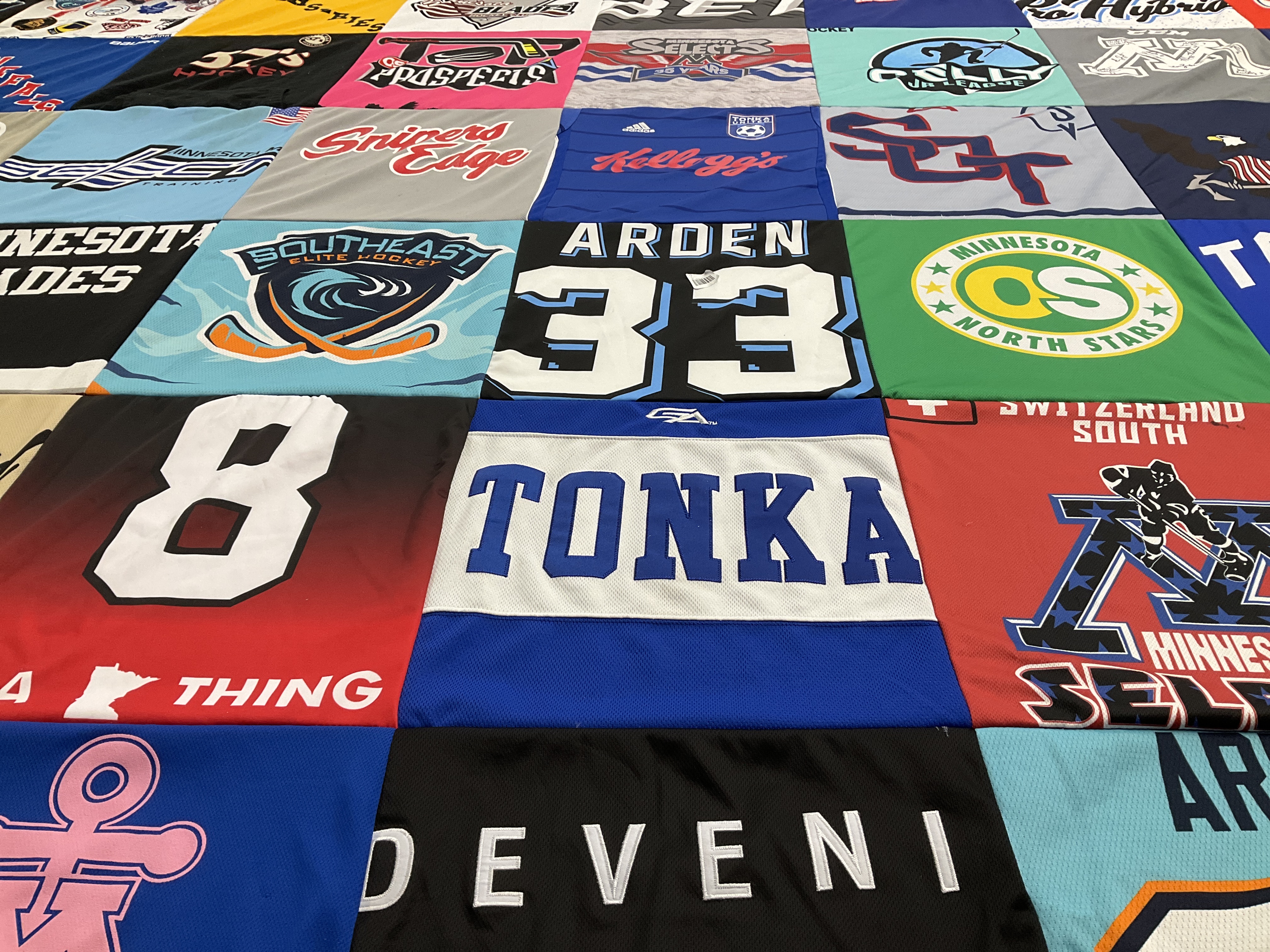 T-shirt quilt with hockey, sports themes by Mark from MN
