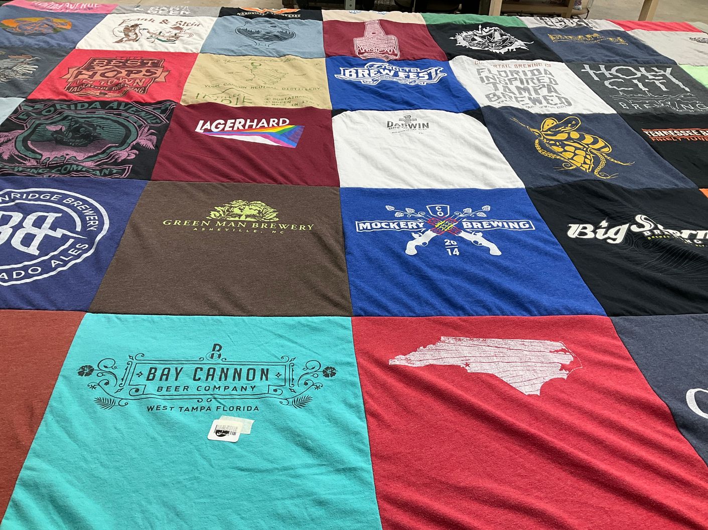 T-shirt quilt with craft beer, breweries themes by Melissa A from NC