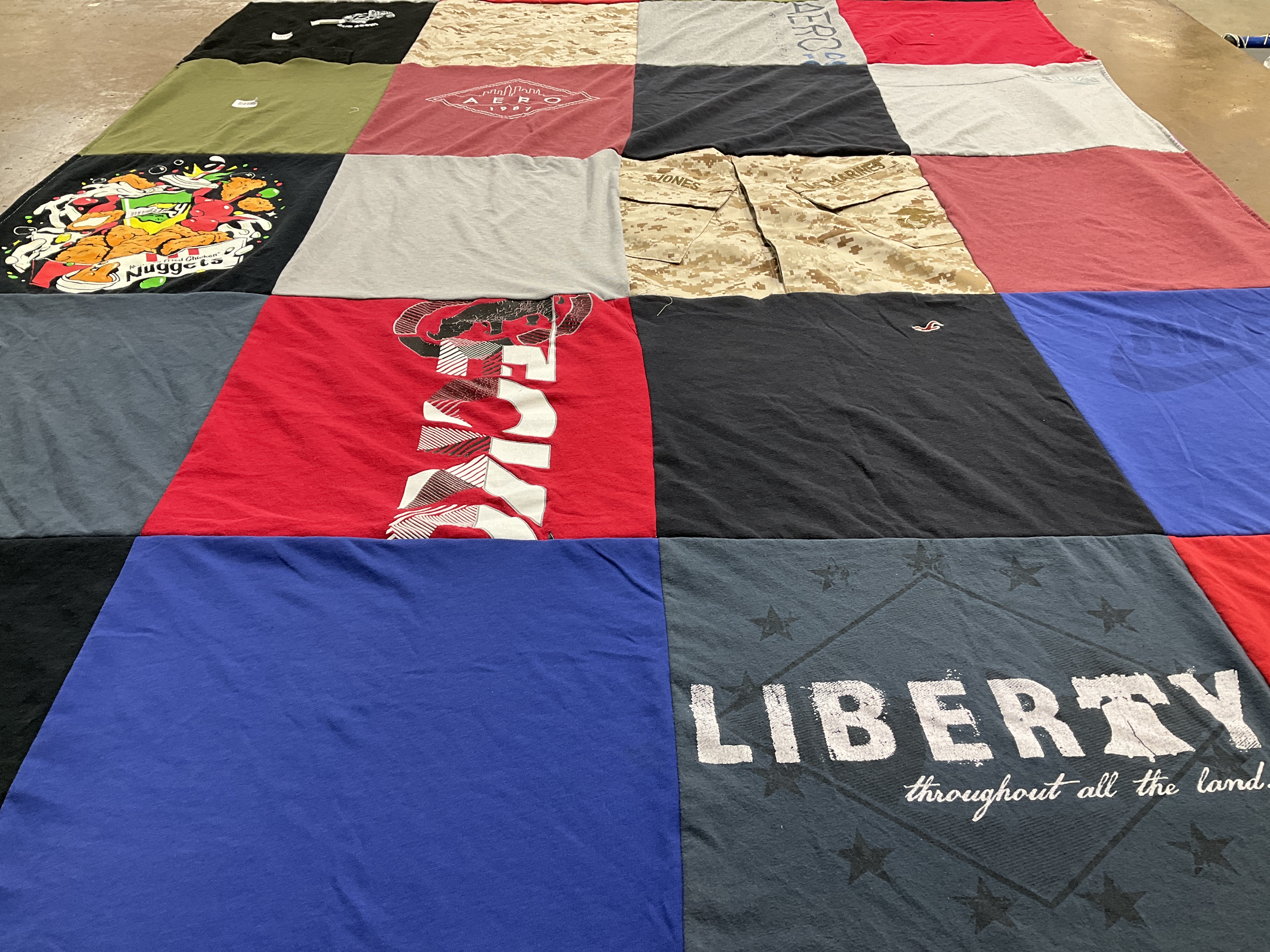 T-shirt quilt with sports, military themes by Jennifer from TX