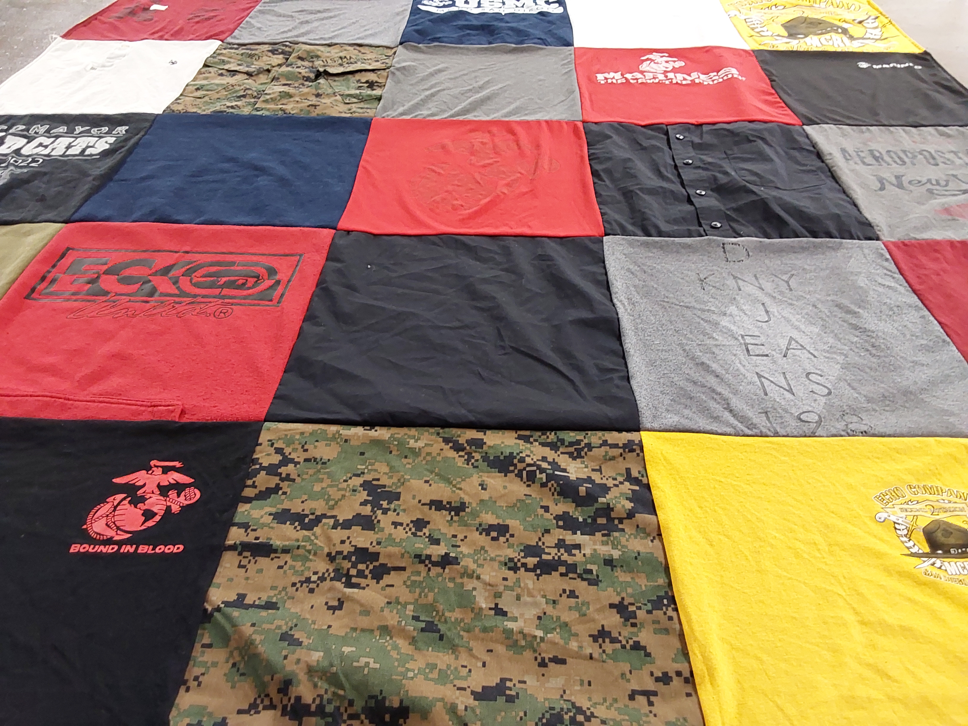 T-shirt quilt with fashion, military themes by Jennifer from TX