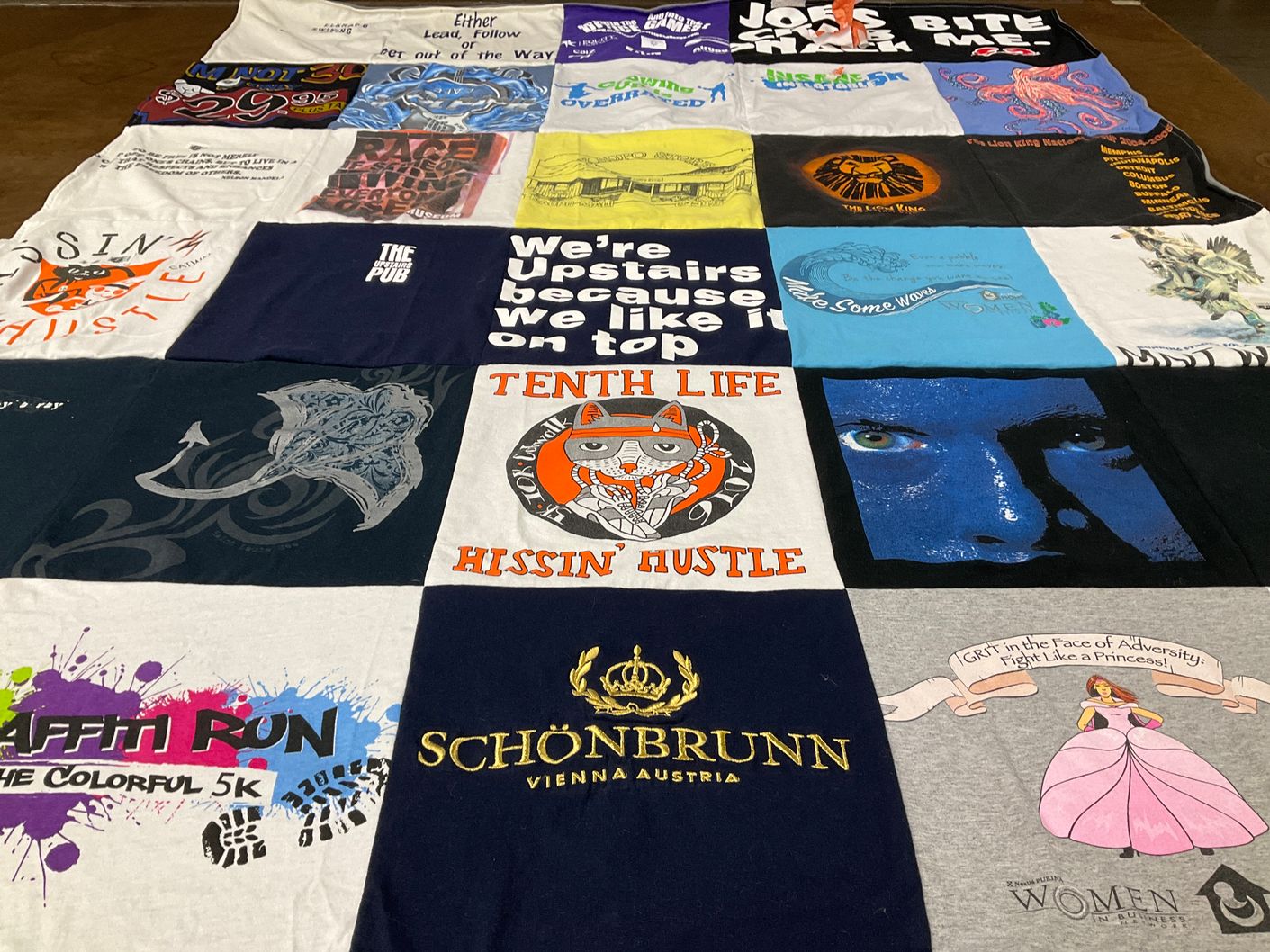 T-shirt quilt with running, entrepreneurship themes by Terry from IN