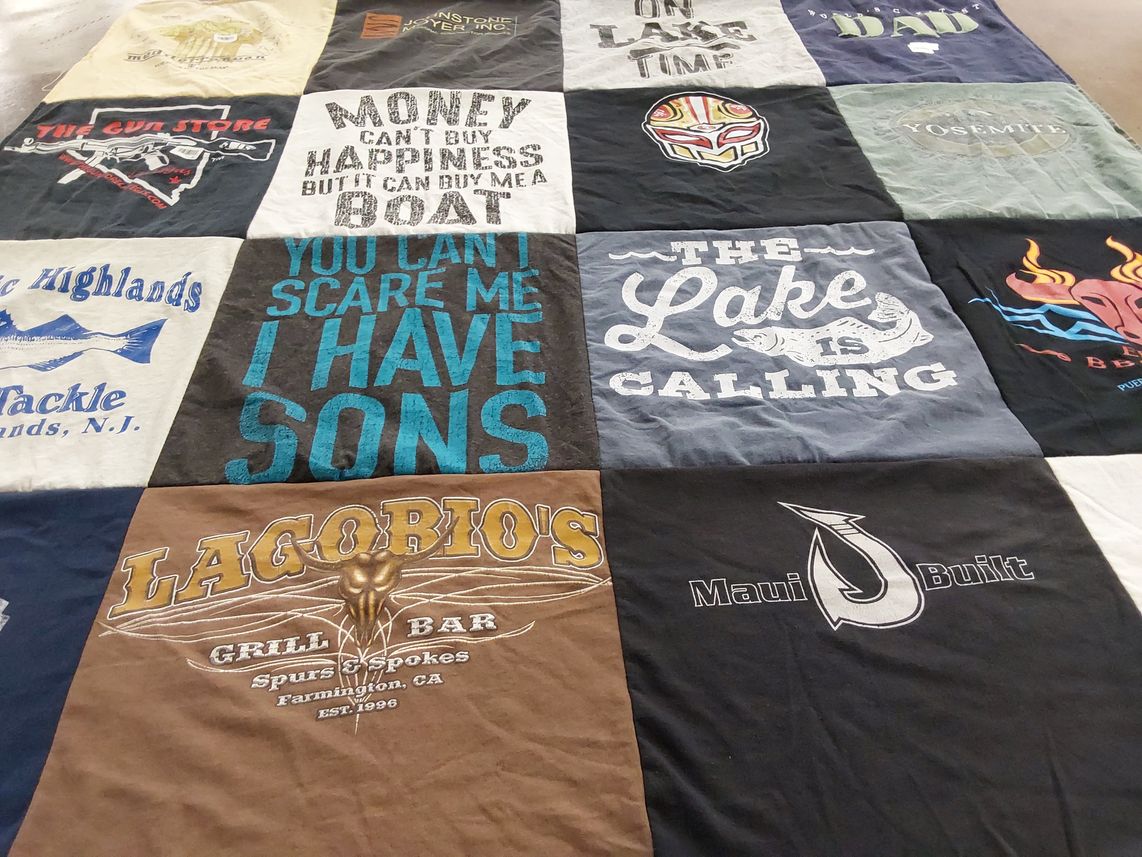 T-shirt quilt with fishing, boating themes by Ron from CA