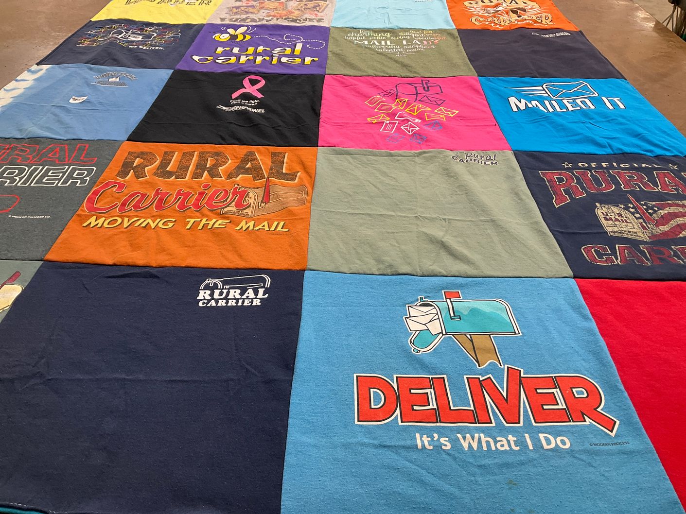 T-shirt quilt with postal services, mail delivery themes by Marlys from IL