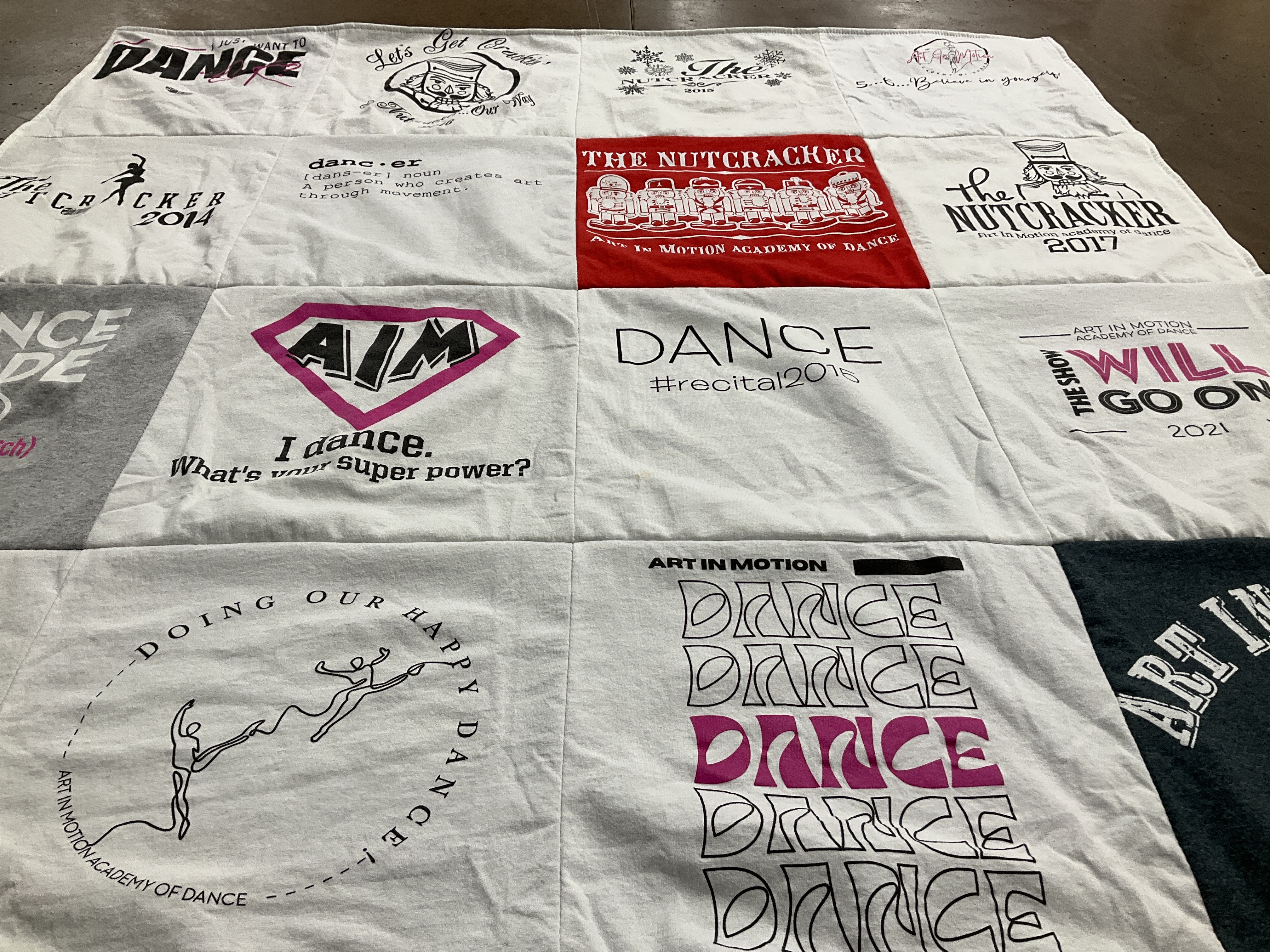 T-shirt quilt with dance, performance themes by Erin from NJ