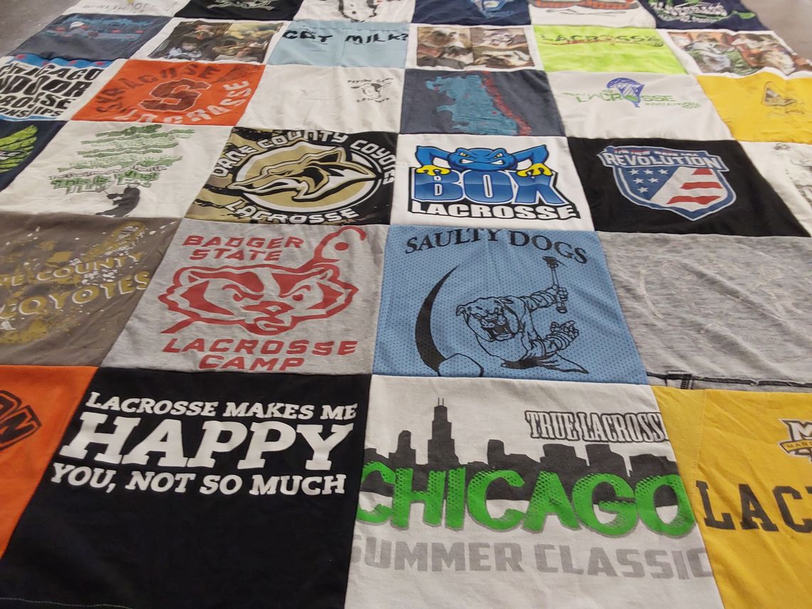 T-shirt quilt featuring badger state lacrosse camp by Joanne from WI