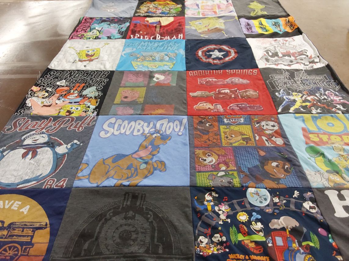 T-shirt quilt with cartoons, animation themes by Jennifer  from NC