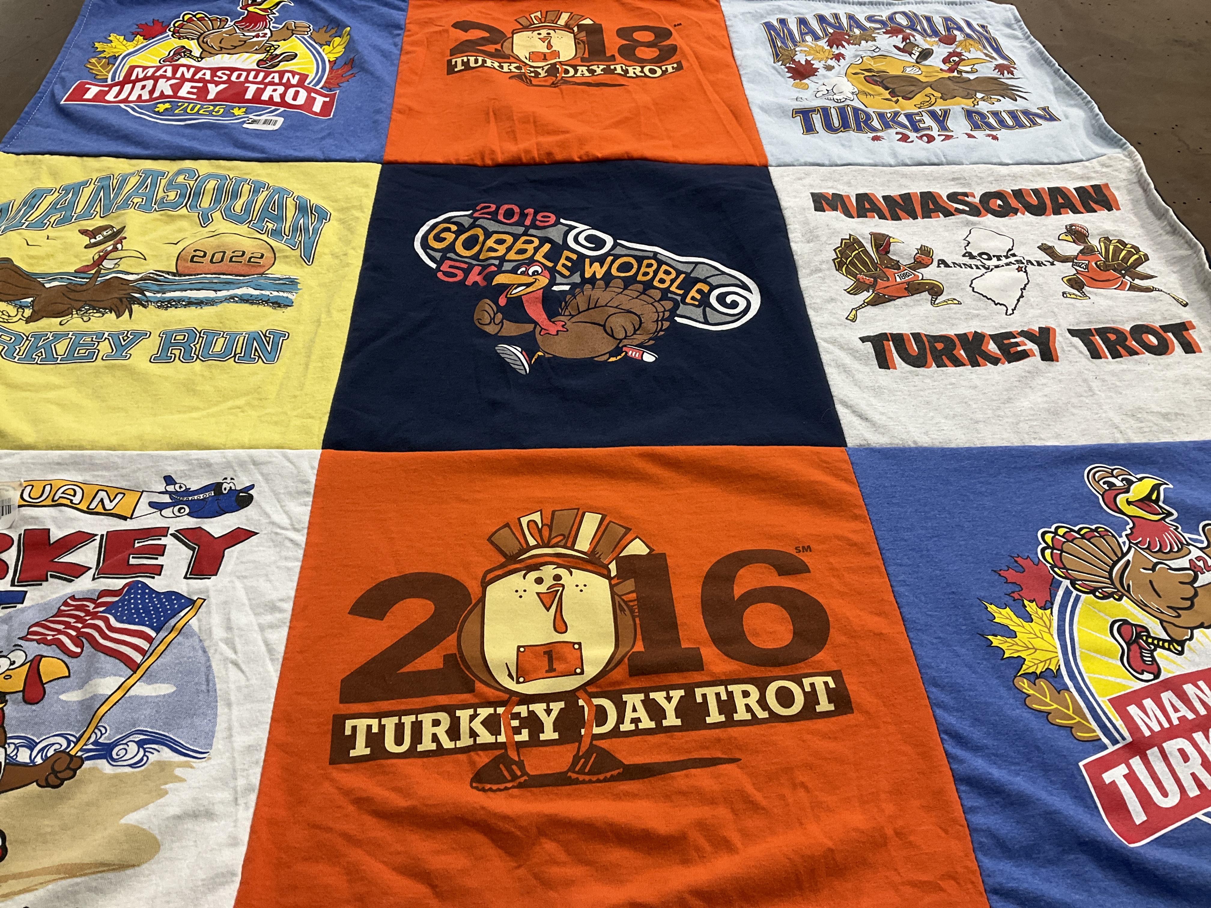 T-shirt quilt with running, thanksgiving themes by Karen from NJ