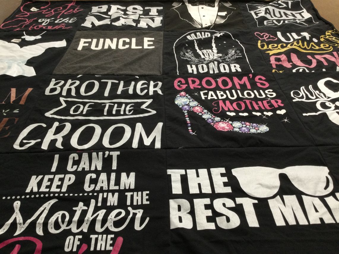T-shirt quilt with weddings, family themes by Mary from TX