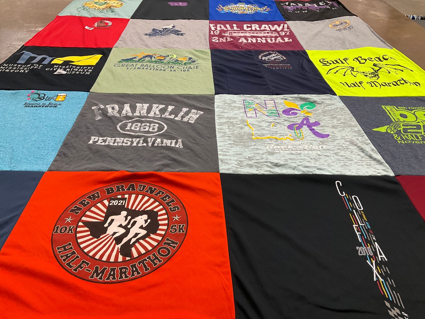 T-shirt quilt with running, marathons themes by Robin from OR
