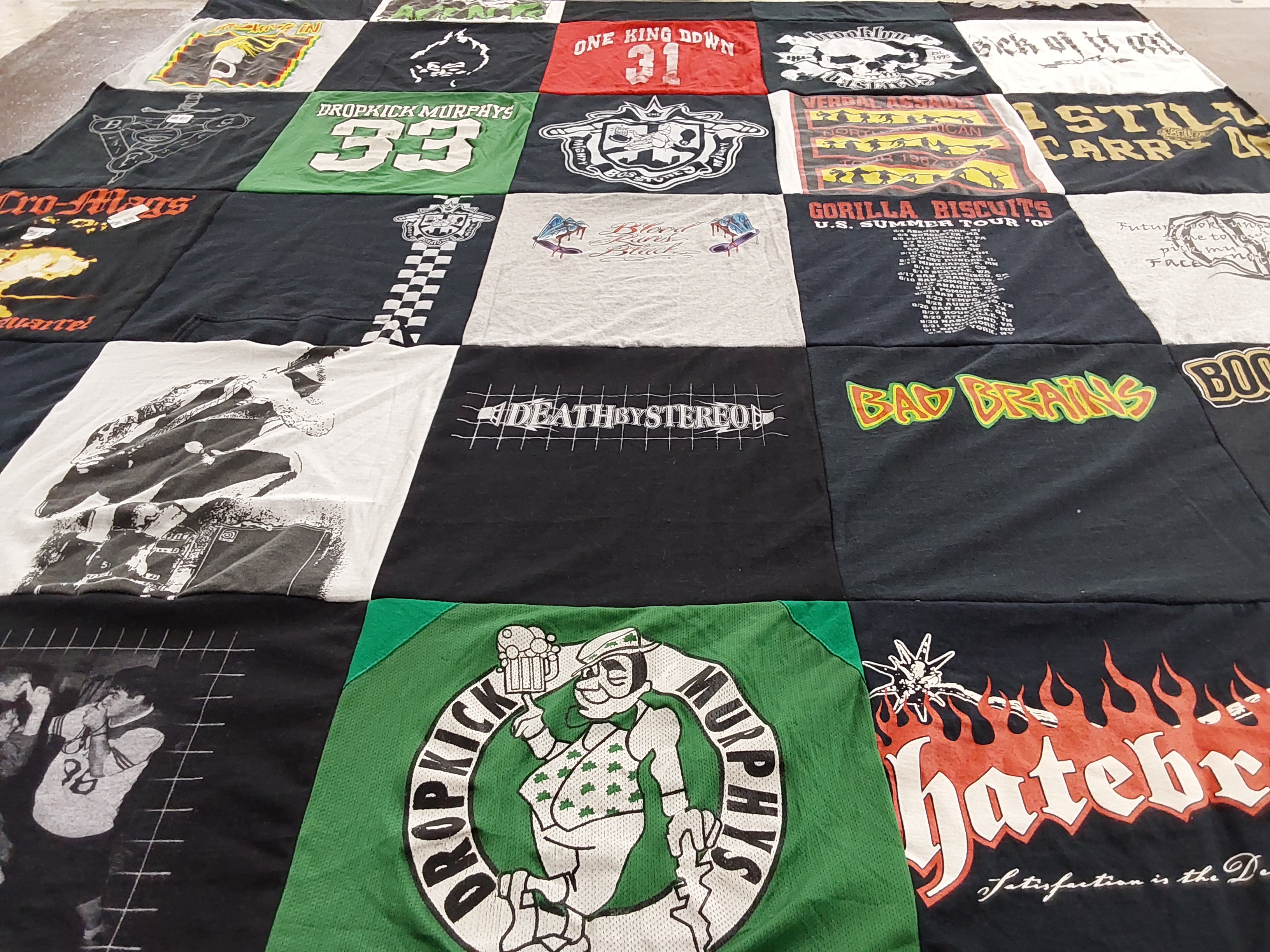 T-shirt quilt with punk, music themes by Taw from TX