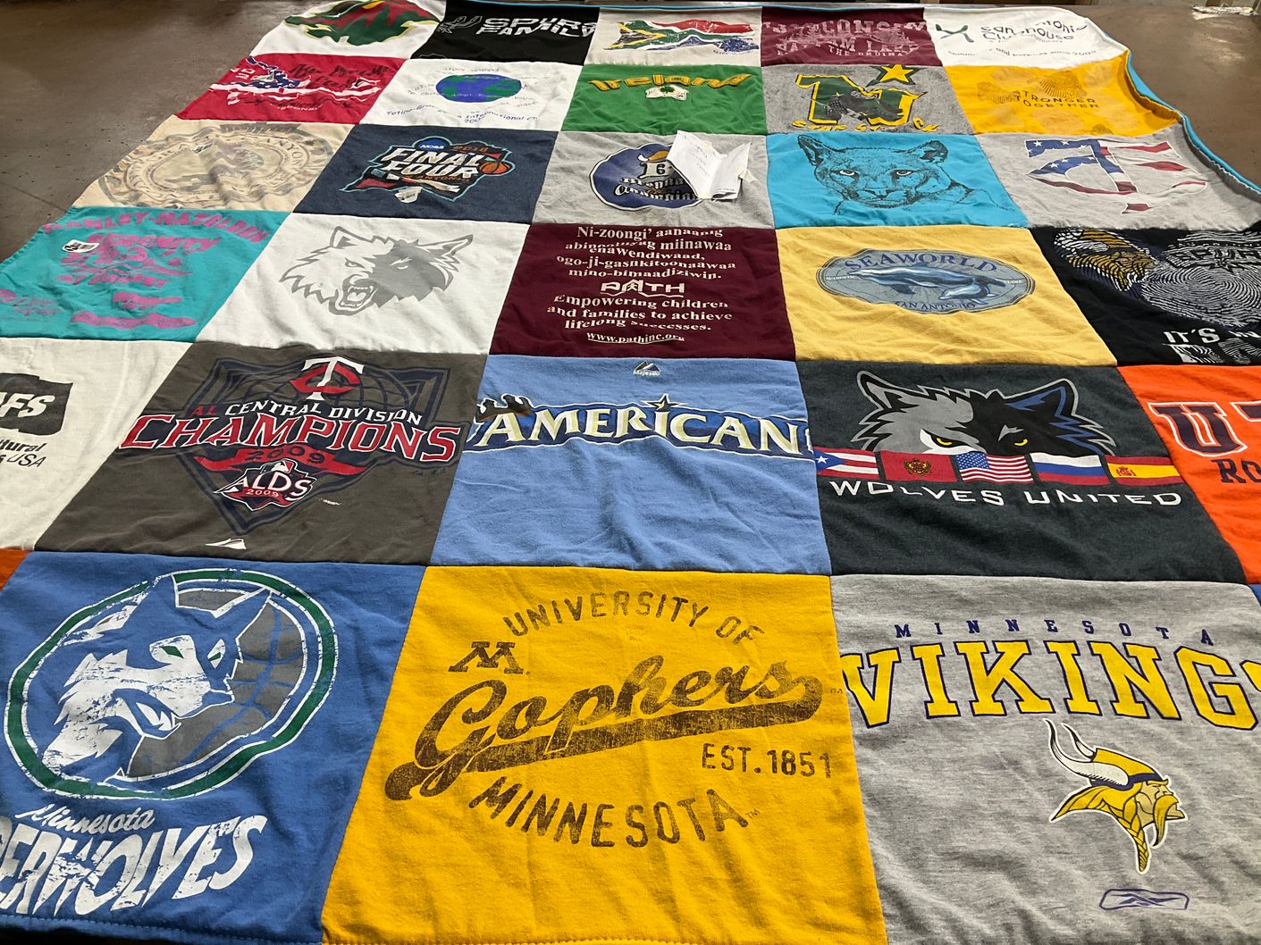T-shirt quilt featuring minnesota golden gophers, minnesota timberwolves by Peggy from TX