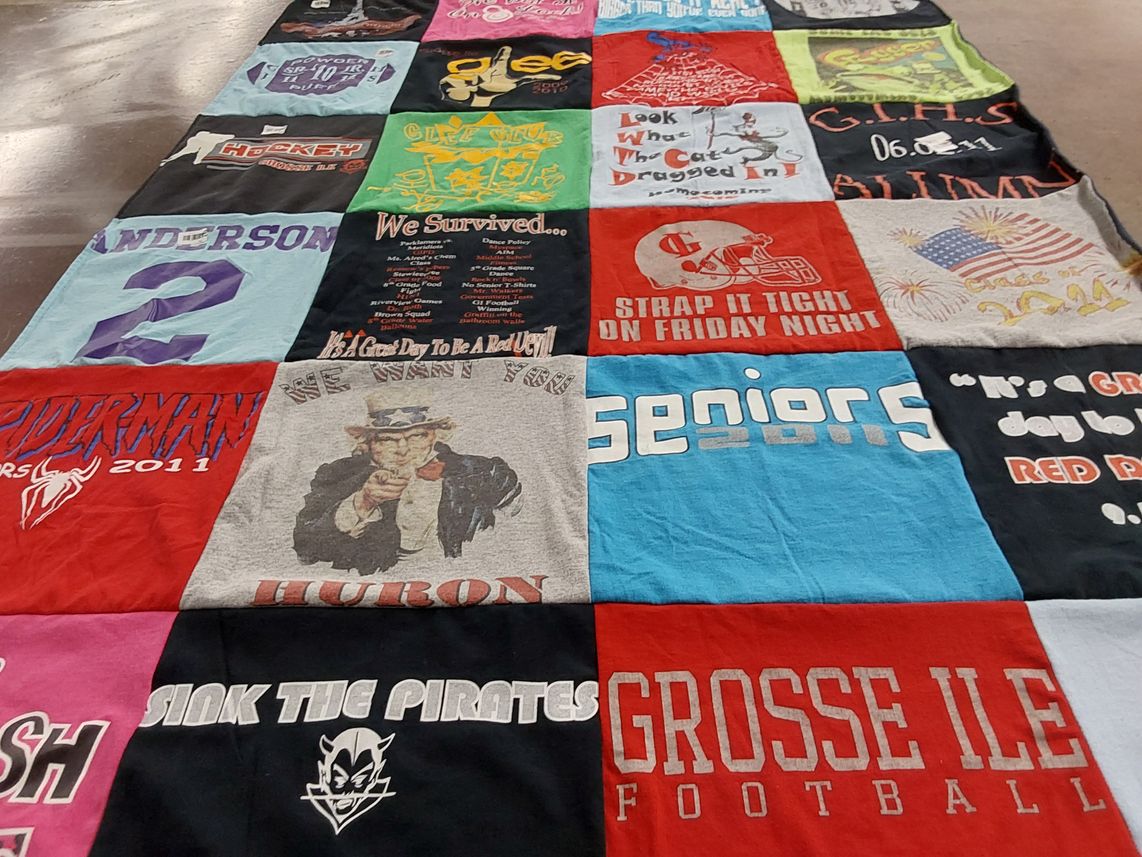 T-shirt quilt featuring grosse ile football, hockey team by Erica from MI