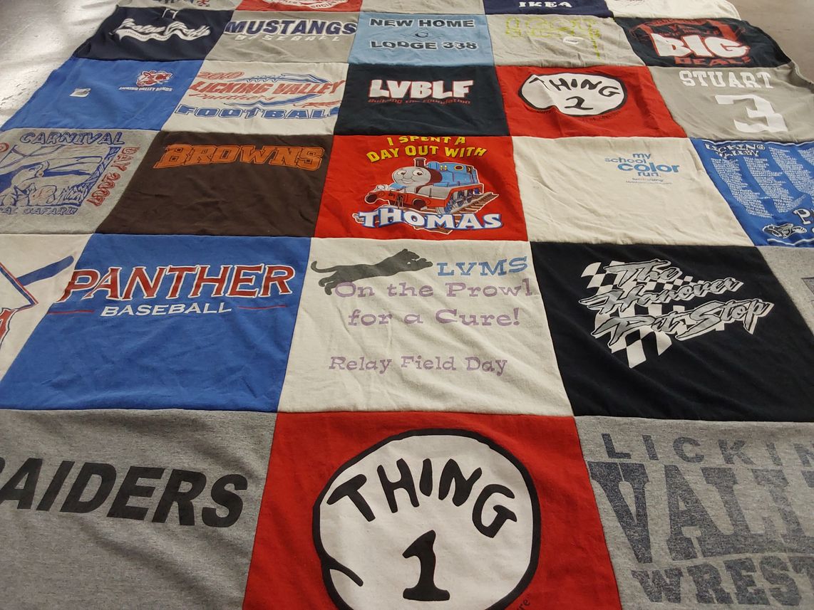 T-shirt quilt featuring licking valley wrestling, browns by Della from OH
