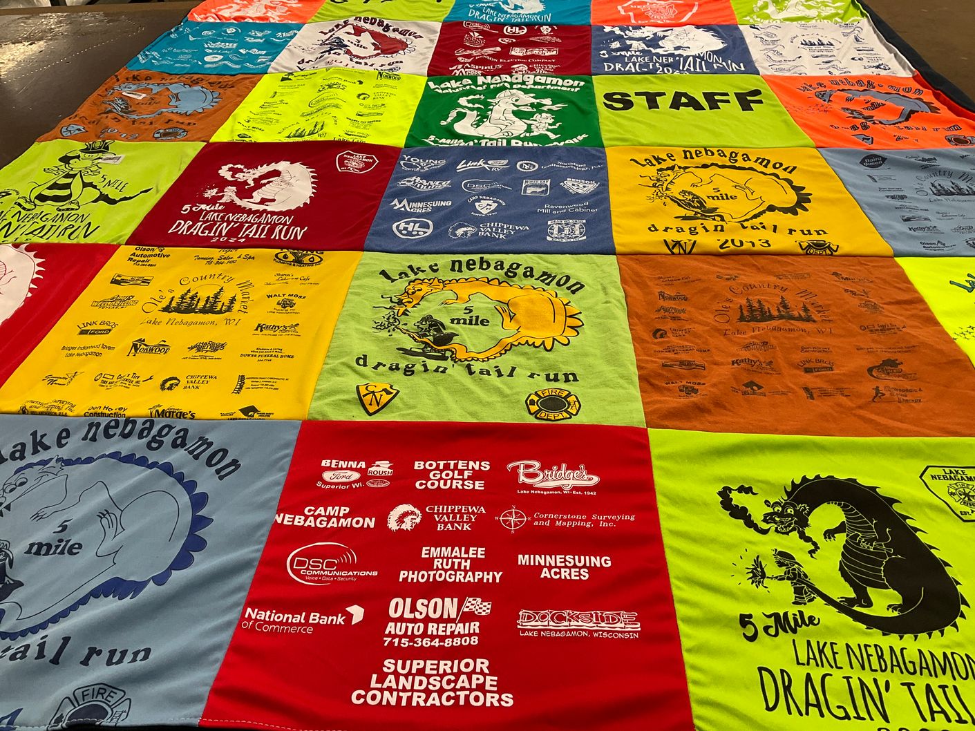 T-shirt quilt with running, camping themes by Katy from WI