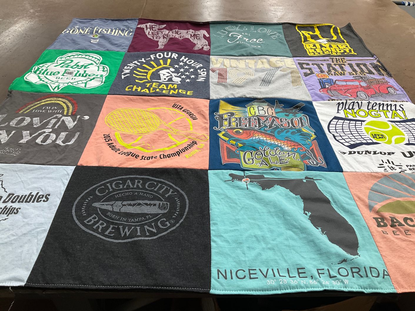 T-shirt quilt with fishing, tennis themes by Carla from GA