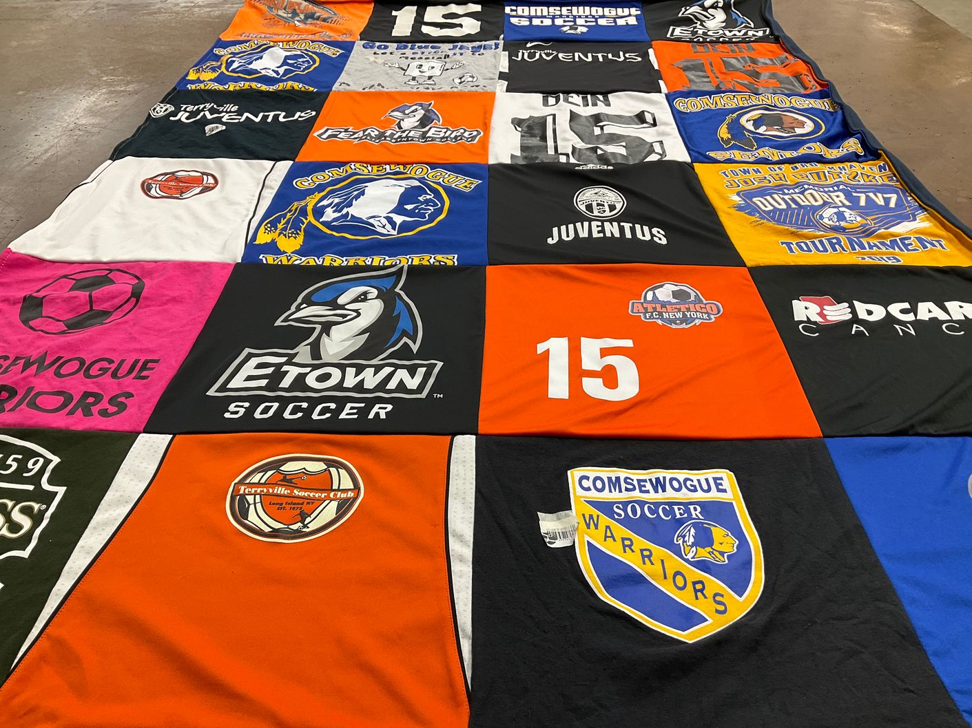 T-shirt quilt featuring comsewogue warriors, etown soccer by Kathryn from NY