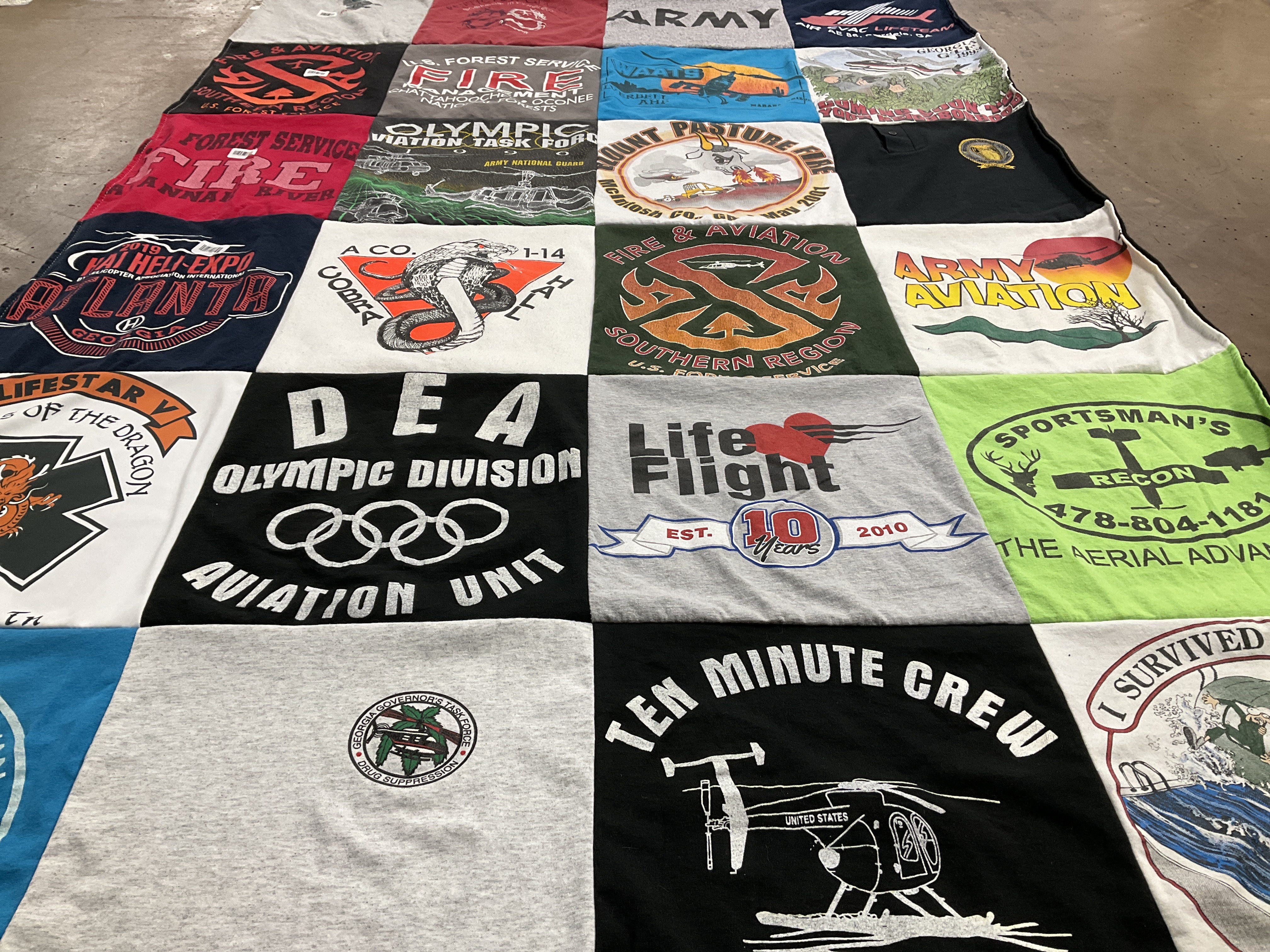T-shirt quilt with aviation, fire service themes by Lee from TN
